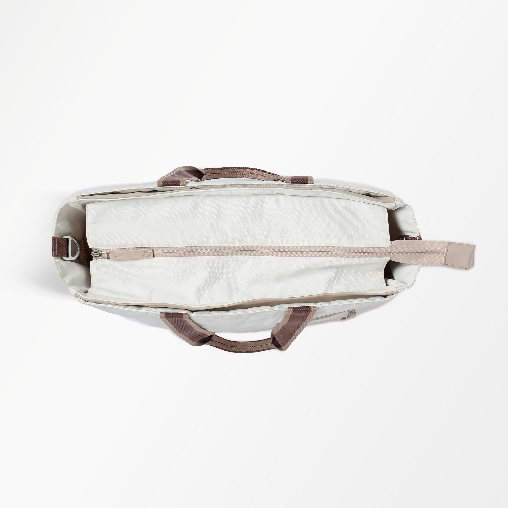 Light grey Tennis Tote by Doubletake, viewed from above, open with an internal zippered pouch and brown carry handles.