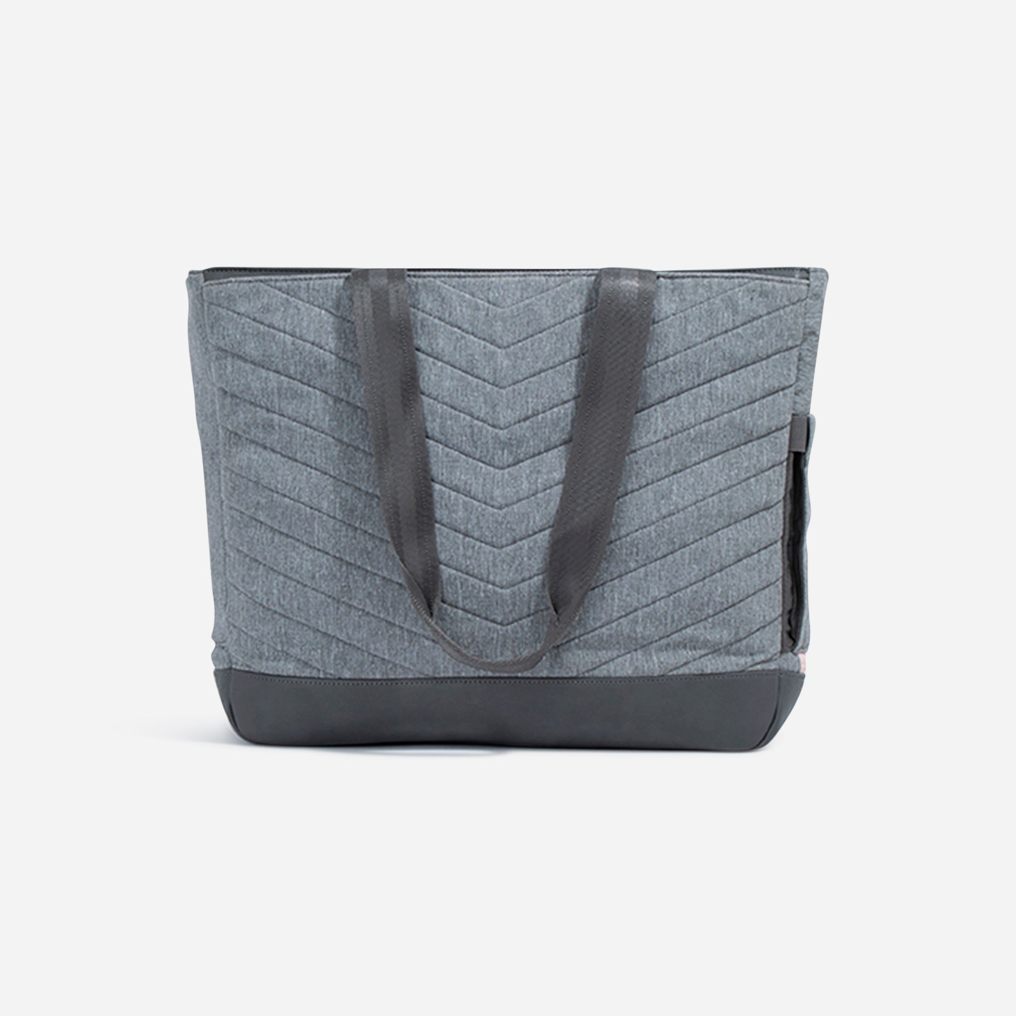 Grey quilted pickleball tote by Doubletake with a chevron pattern, dark base, and side pocket, front view.