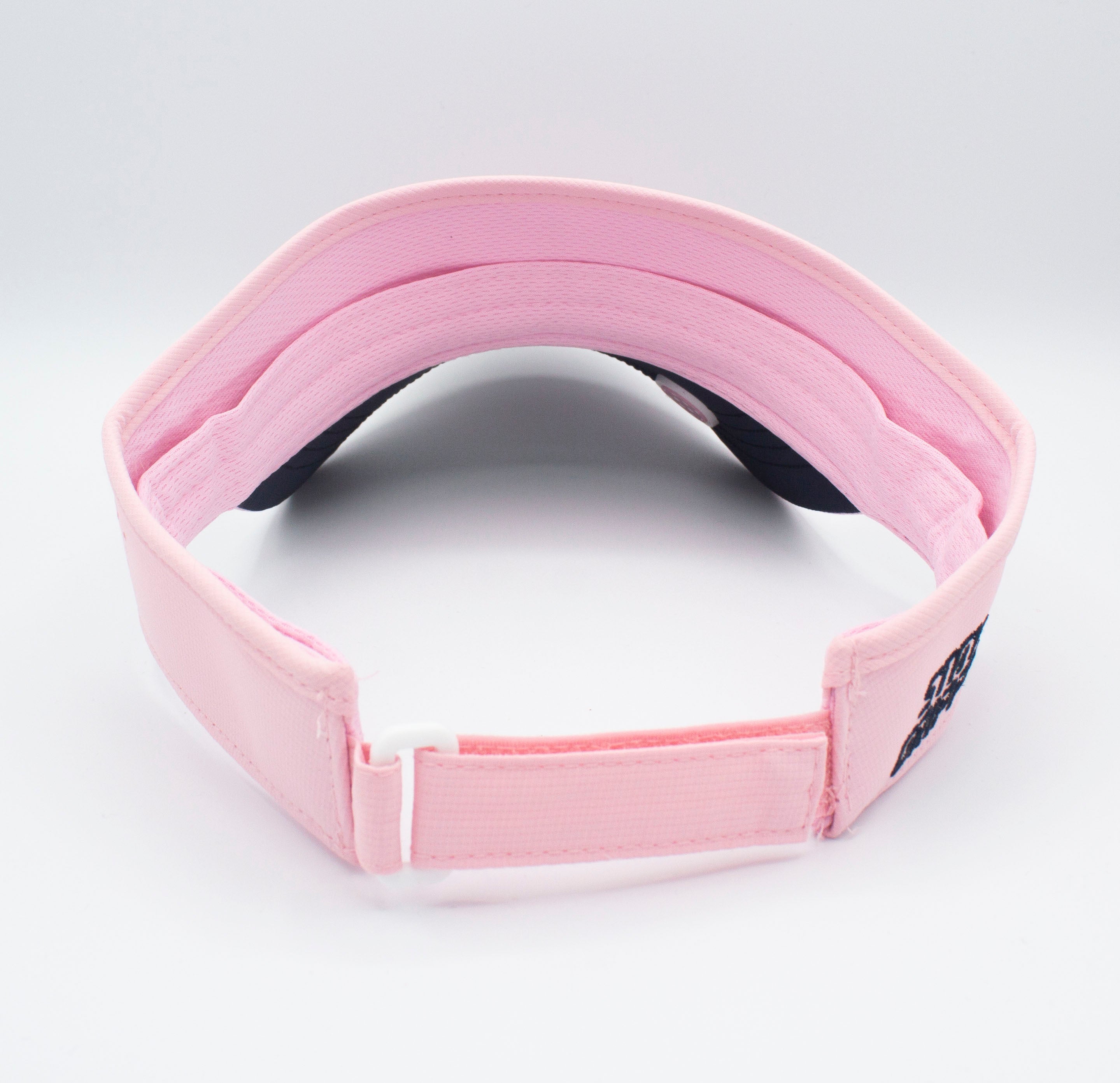 Back of pink baseball visor.