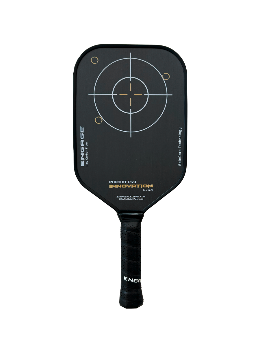 Black pickleball paddle with a target pattern by EngagePickleball, featuring white and gold markings and a grooved black grip.