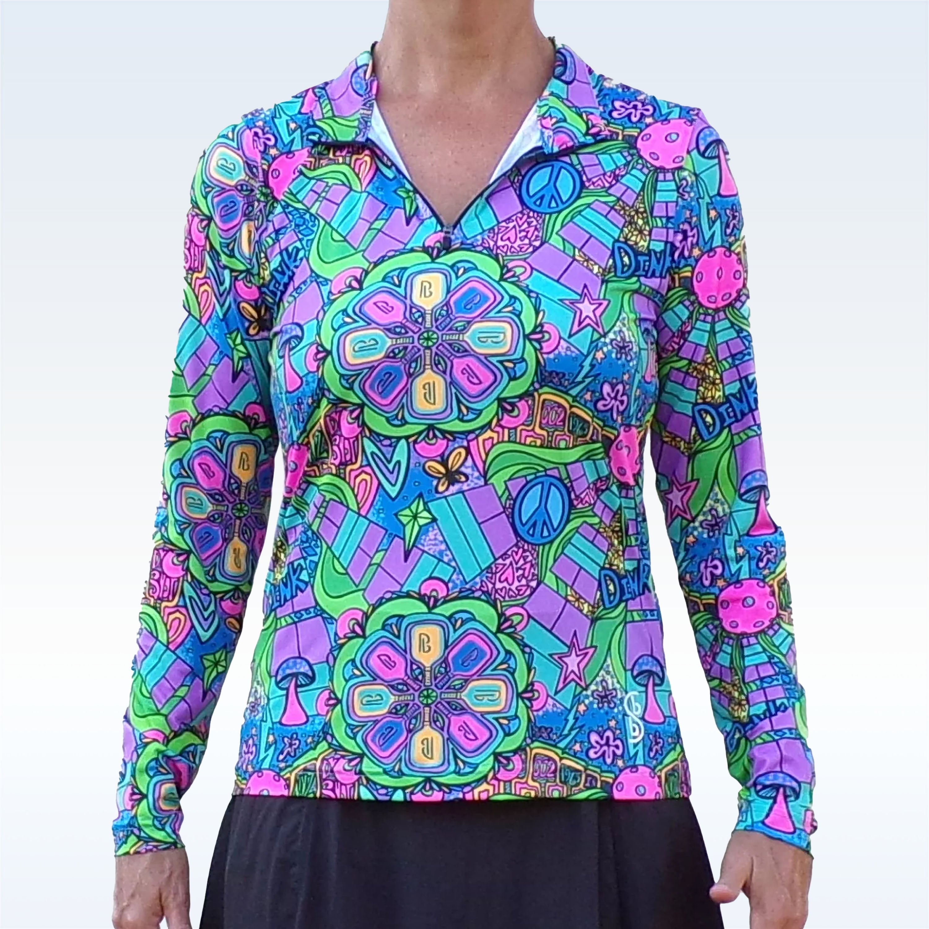 Vibrant patterned long sleeve 1/4 zip pullover by Pickleball Bella, featuring peace signs, mushrooms, and paddle motifs.