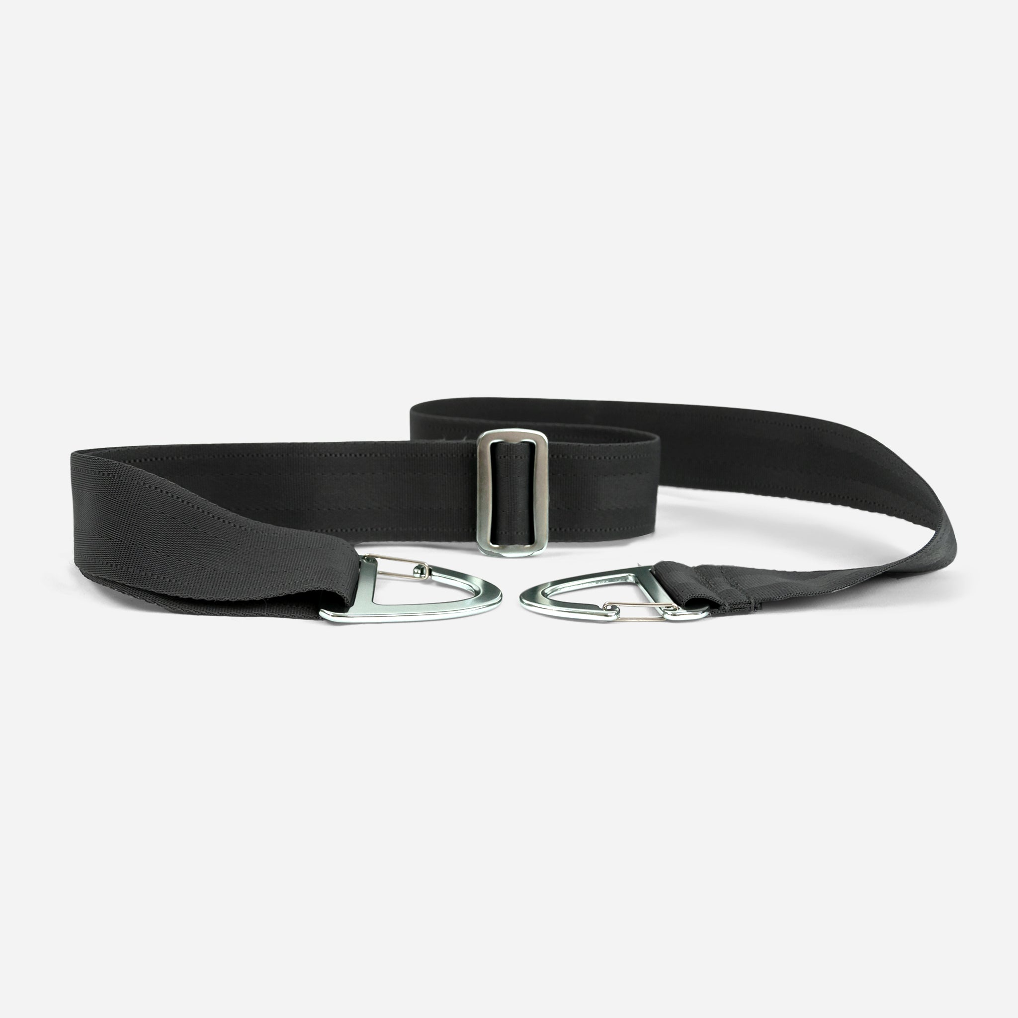 A black fabric belt with two silver-colored D-rings and a square metal buckle.