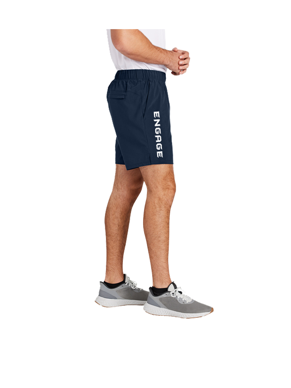 Dark blue men's shorts by EngagePickleball with 'ENGAGE' printed vertically in white on the left leg, seen from a side view.