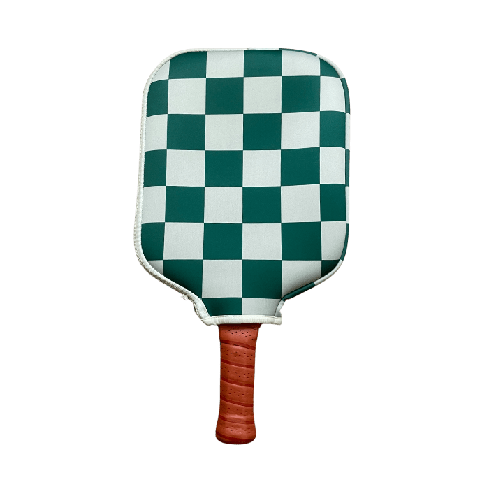 Pickleball paddle with green and white checkerboard pattern and brown handle.