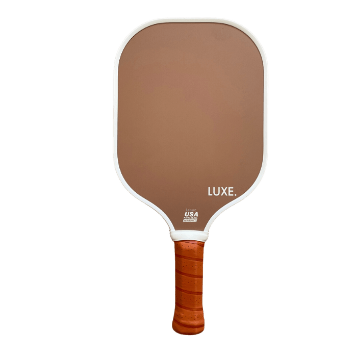 Brown pickleball paddle with white trim and leather handle.