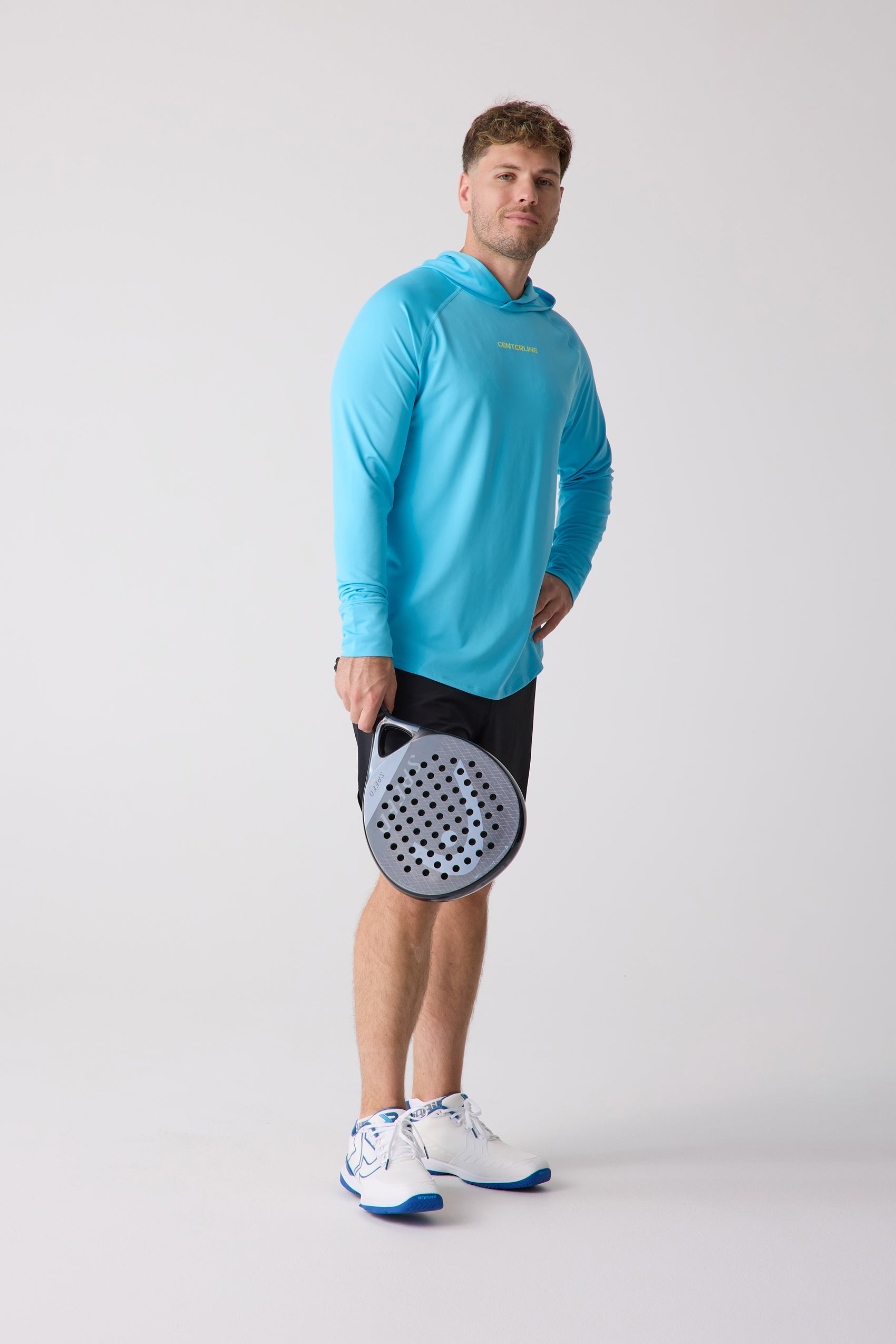 Blue long-sleeved men's layering hoodie by Centerline Athletics, featuring "CENTERLINE" text on the chest.