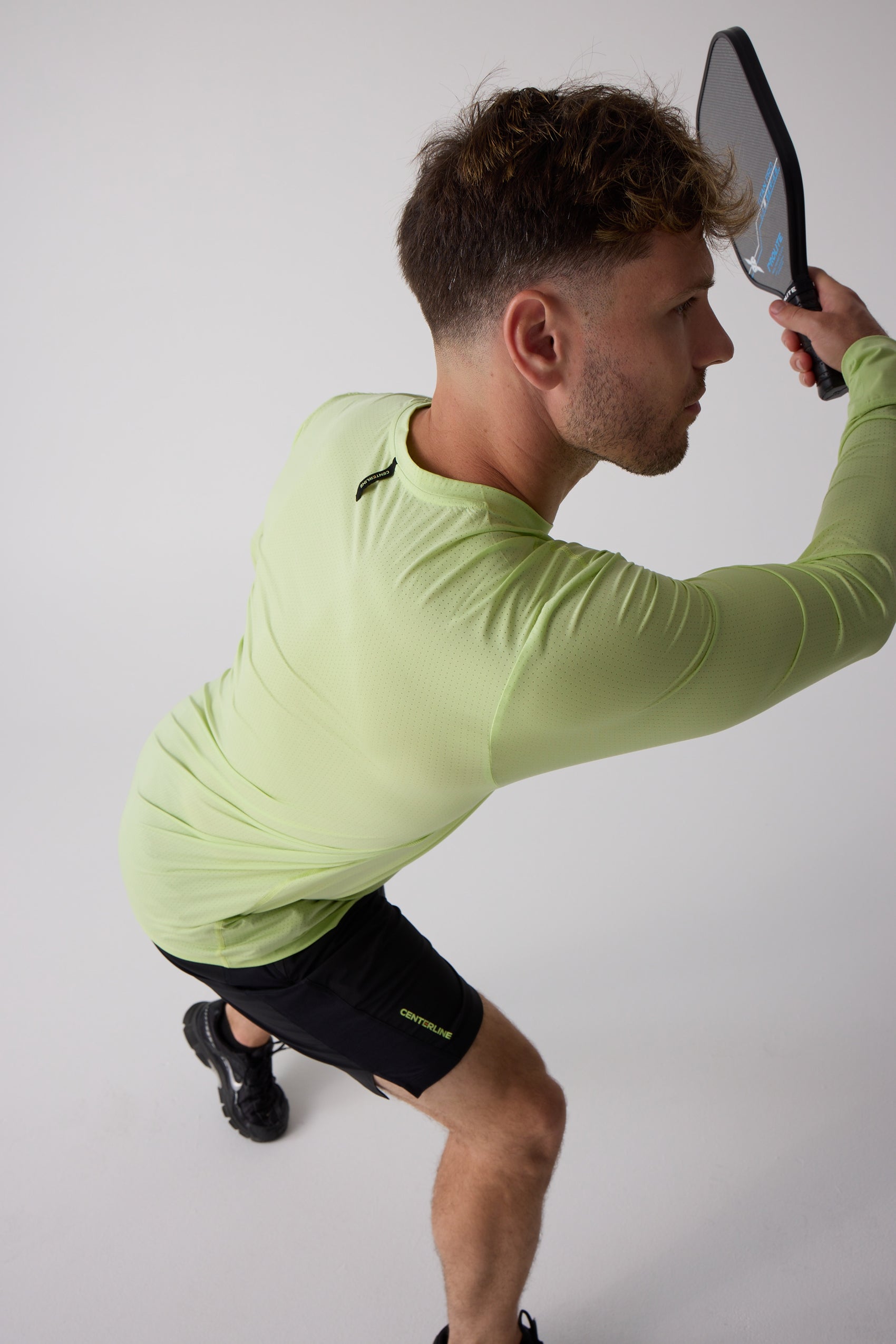 Men's lime green AirLite long sleeve by Centerline Athletics, with a distinct perforated texture.