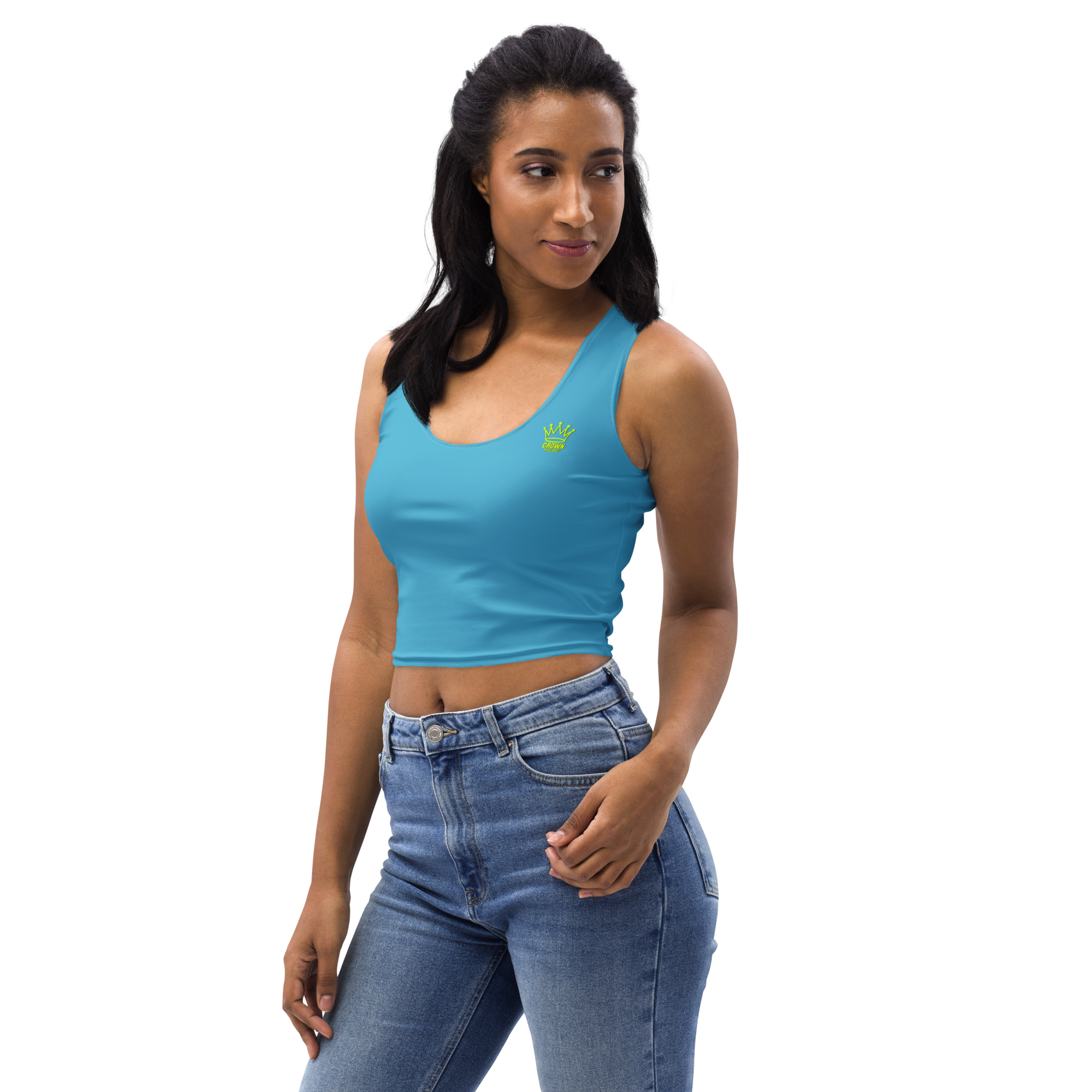 Woman in a blue crop top and blue jeans.