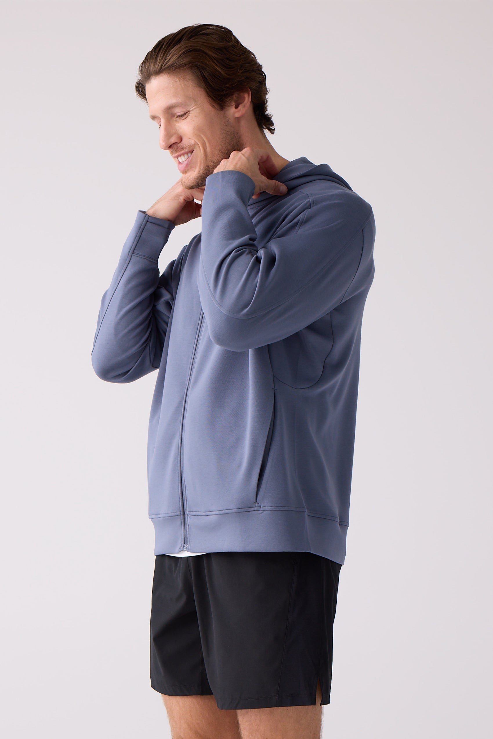 Slate blue Unisex Crew Sweatshirt by Centerline Athletics, made from smooth fabric and worn by a man.