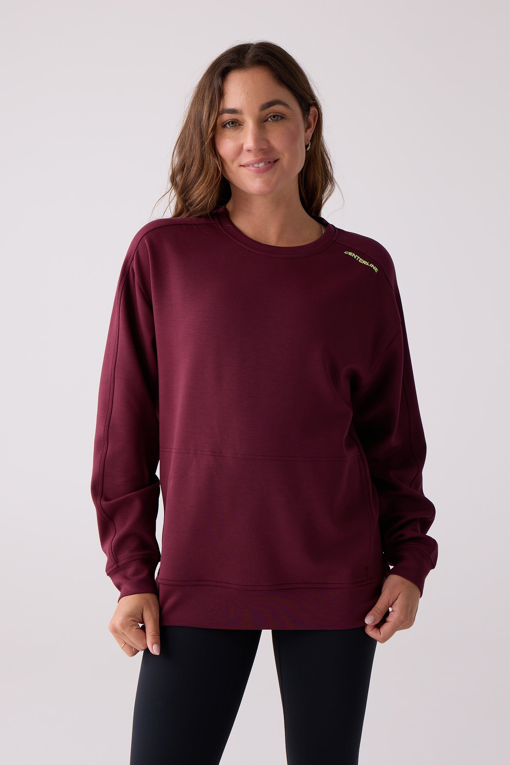 Maroon crew sweatshirt by Centerline Athletics, featuring long sleeves, distinctive stitch details, and a small yellow brand logo on the shoulder.