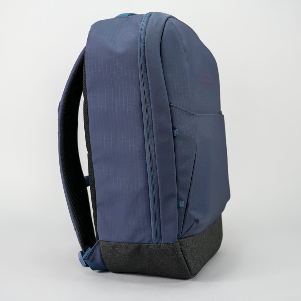 Blue backpack, side view.