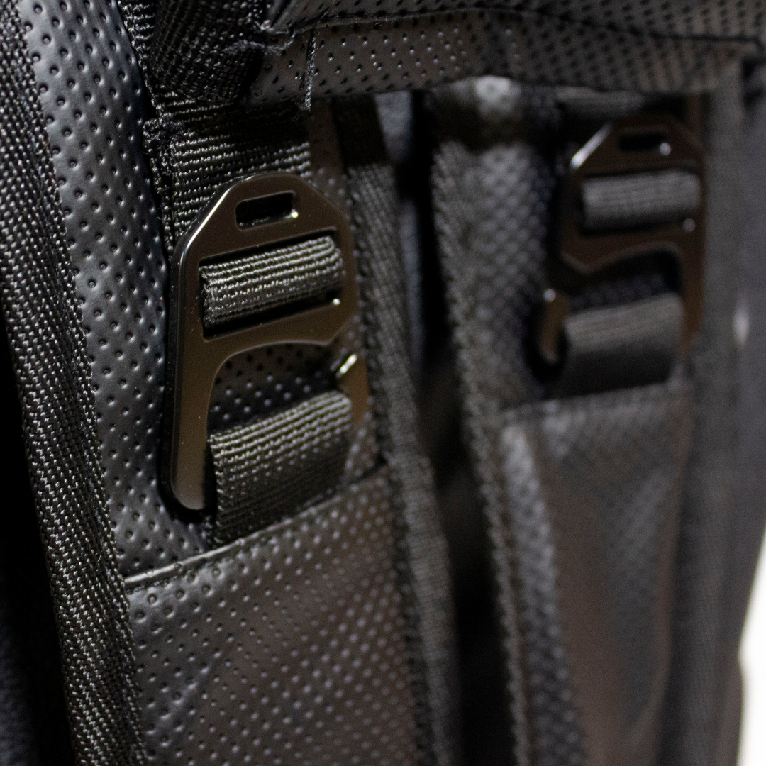 Black duffle bag by Bodhi Pickleball, featuring textured material and metallic buckles on straps, cropped.