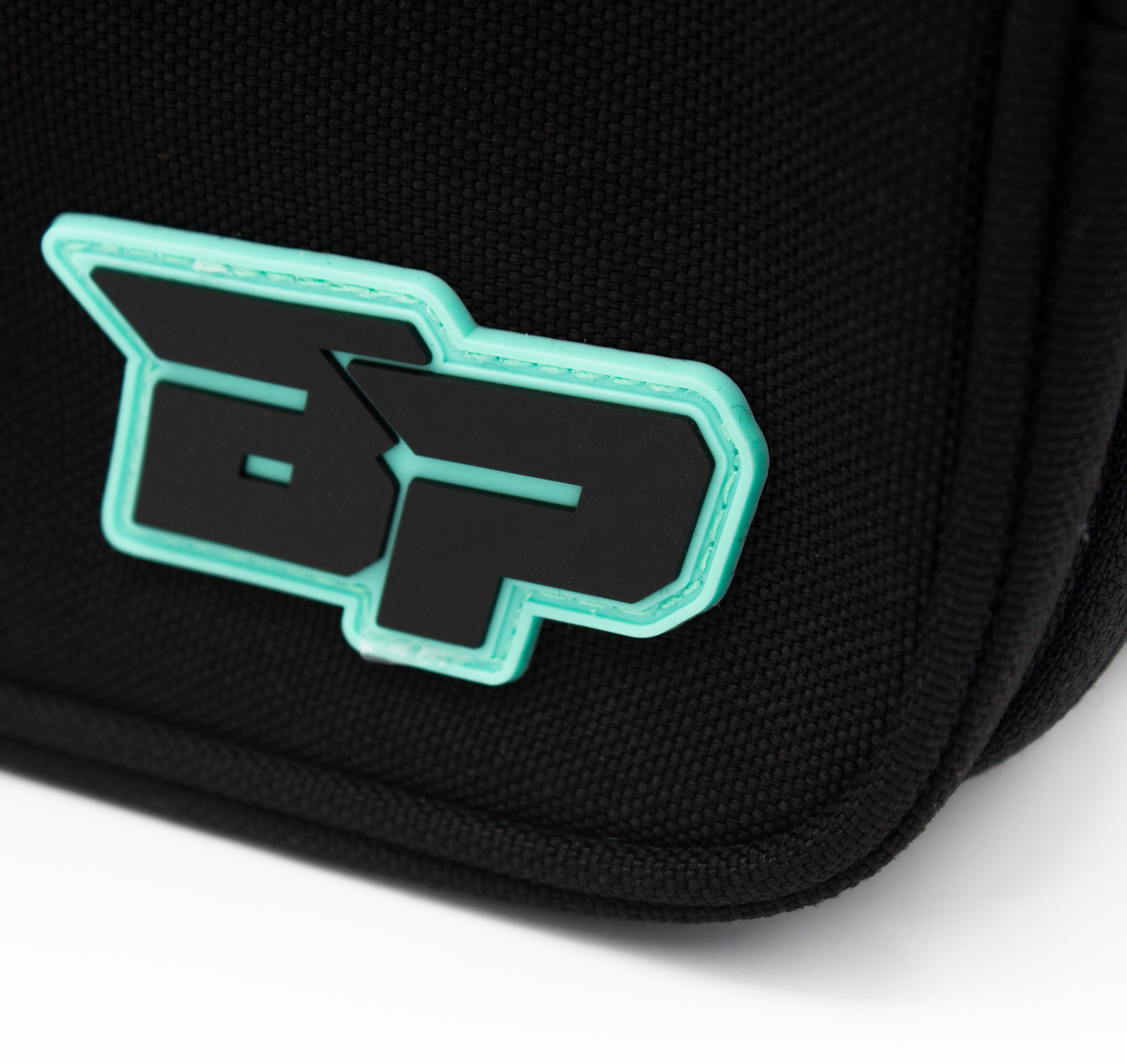Black accessory case by Bodhi Performance with a mint green outlined BP logo on woven fabric, close-up.