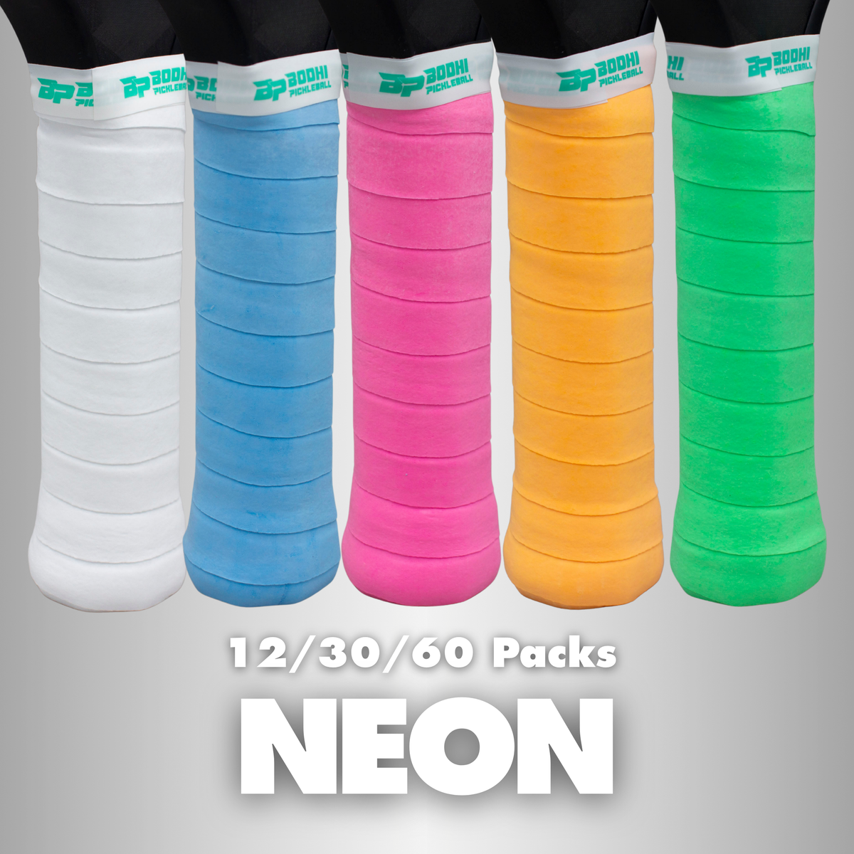 Neon-colored DRYtack overgrips by Bodhi Pickleball, five vibrant hues wrapped on racket handles, textured grip surface, side view display