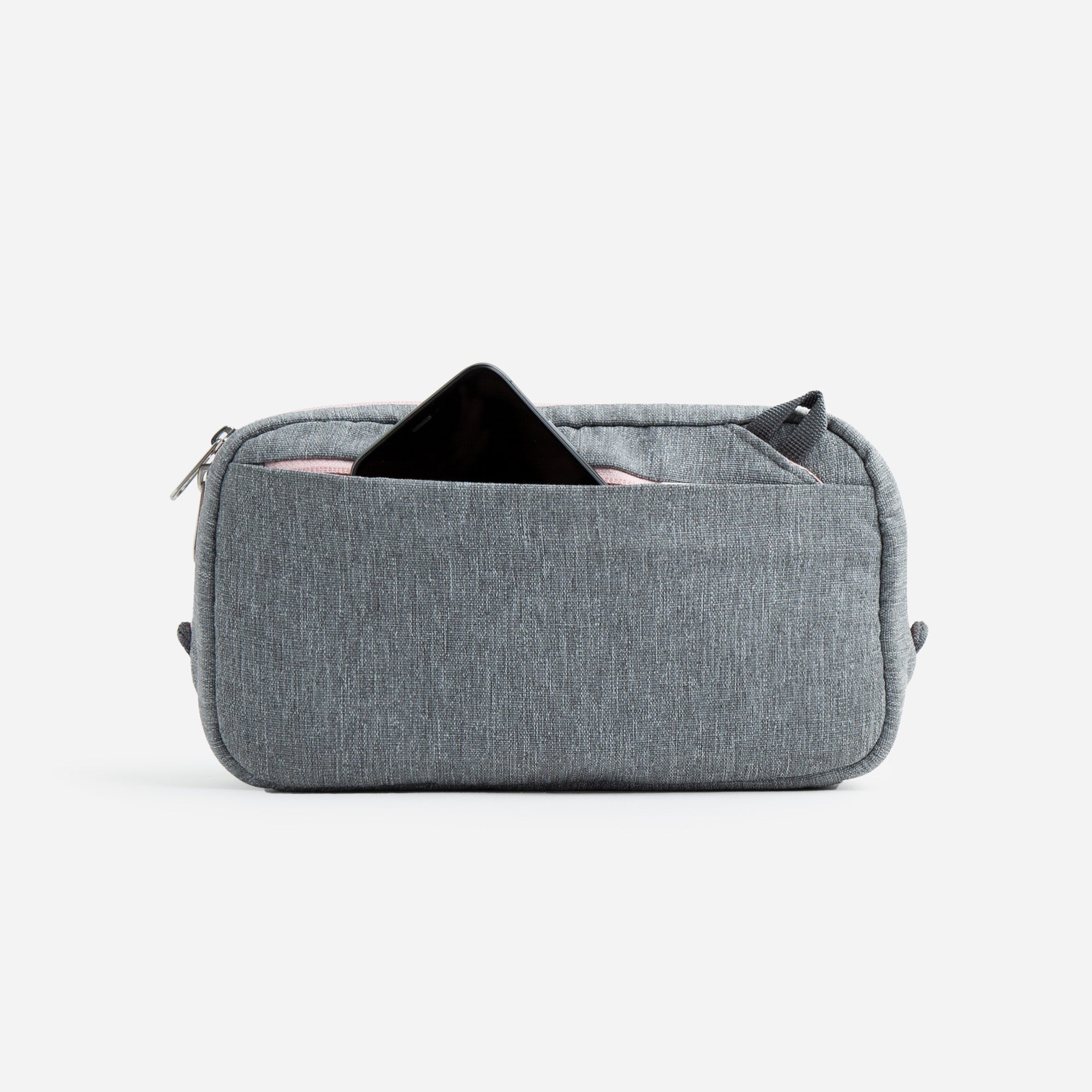 Gray zippered pouch with a phone in the front pocket.