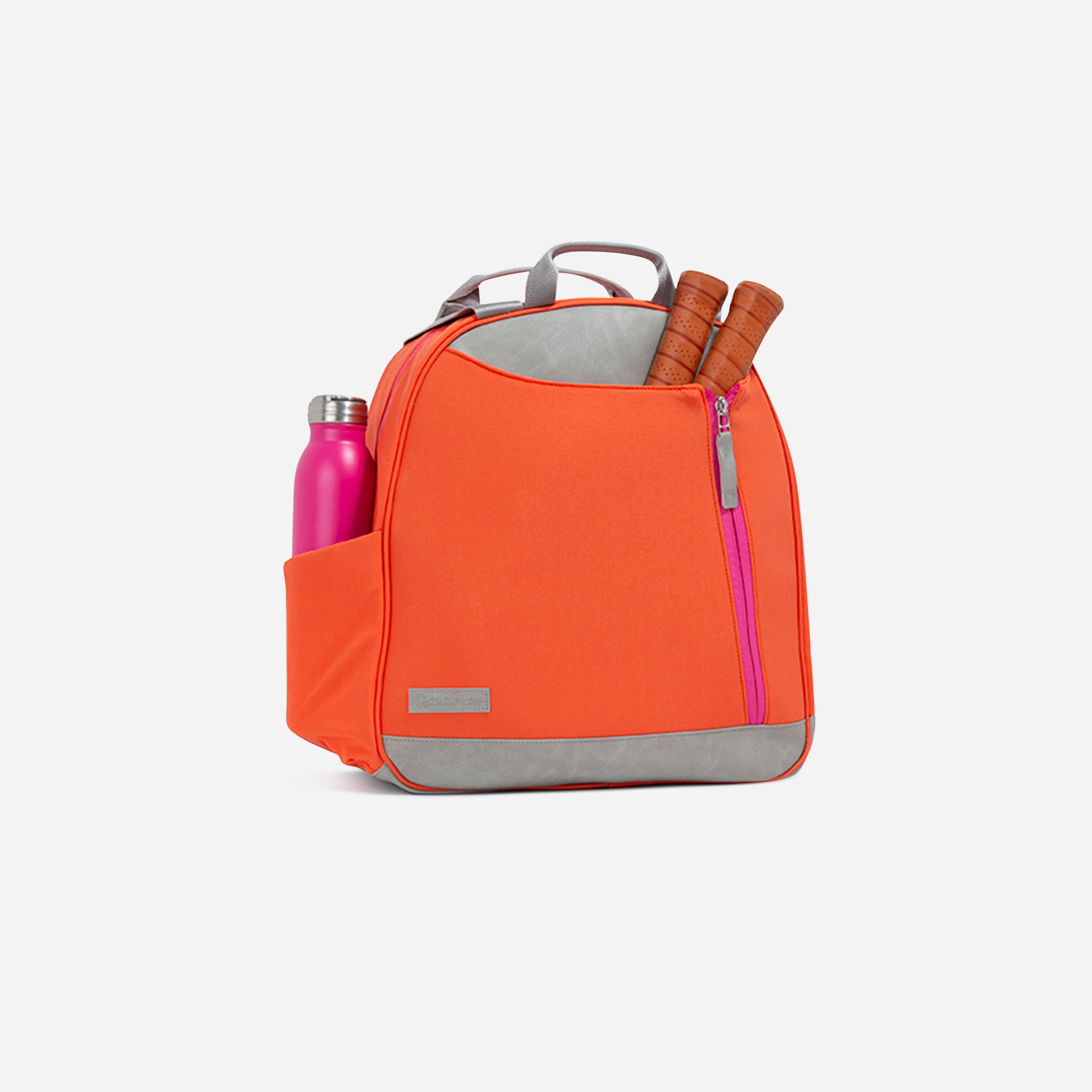 Orange and gray tennis backpack with water bottle and tennis racket handles sticking out.