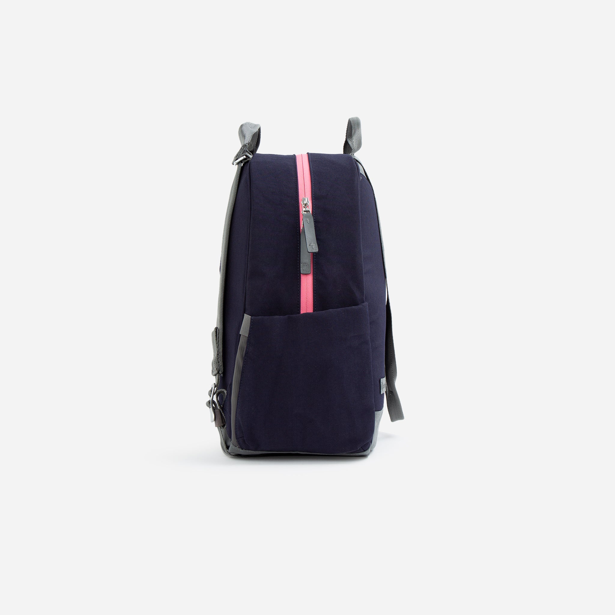 Navy blue Pickleball Backpack by Doubletake with gray accents, a bright pink zipper, and front pocket.