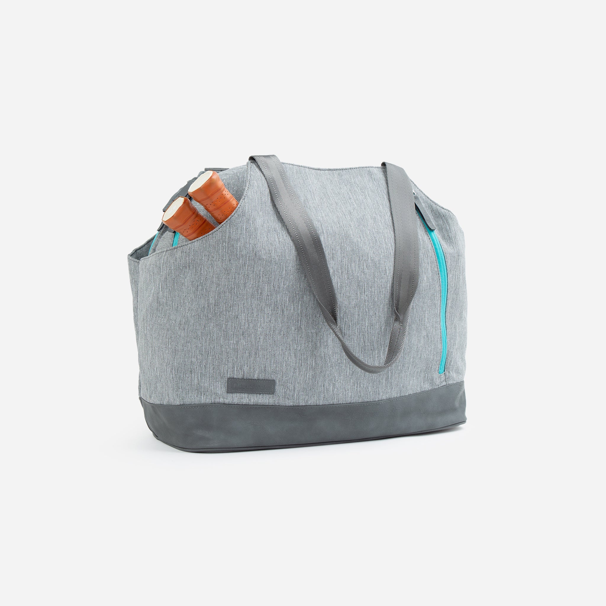 Gray tennis tote bag with brown grips.