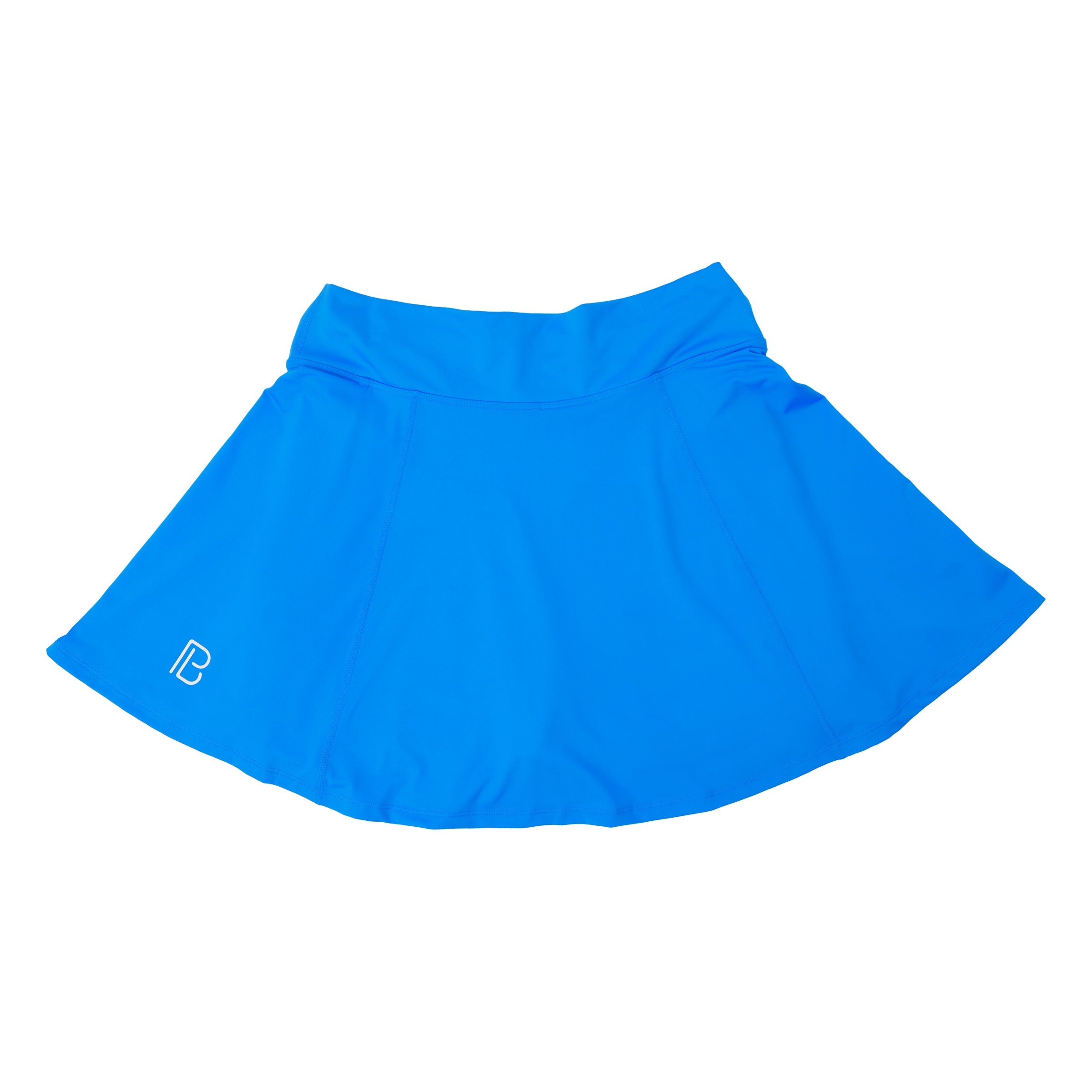 Electric Blue A-Line Skort by Pickleball Bella with a white PB logo on the lower left hem, flat lay.