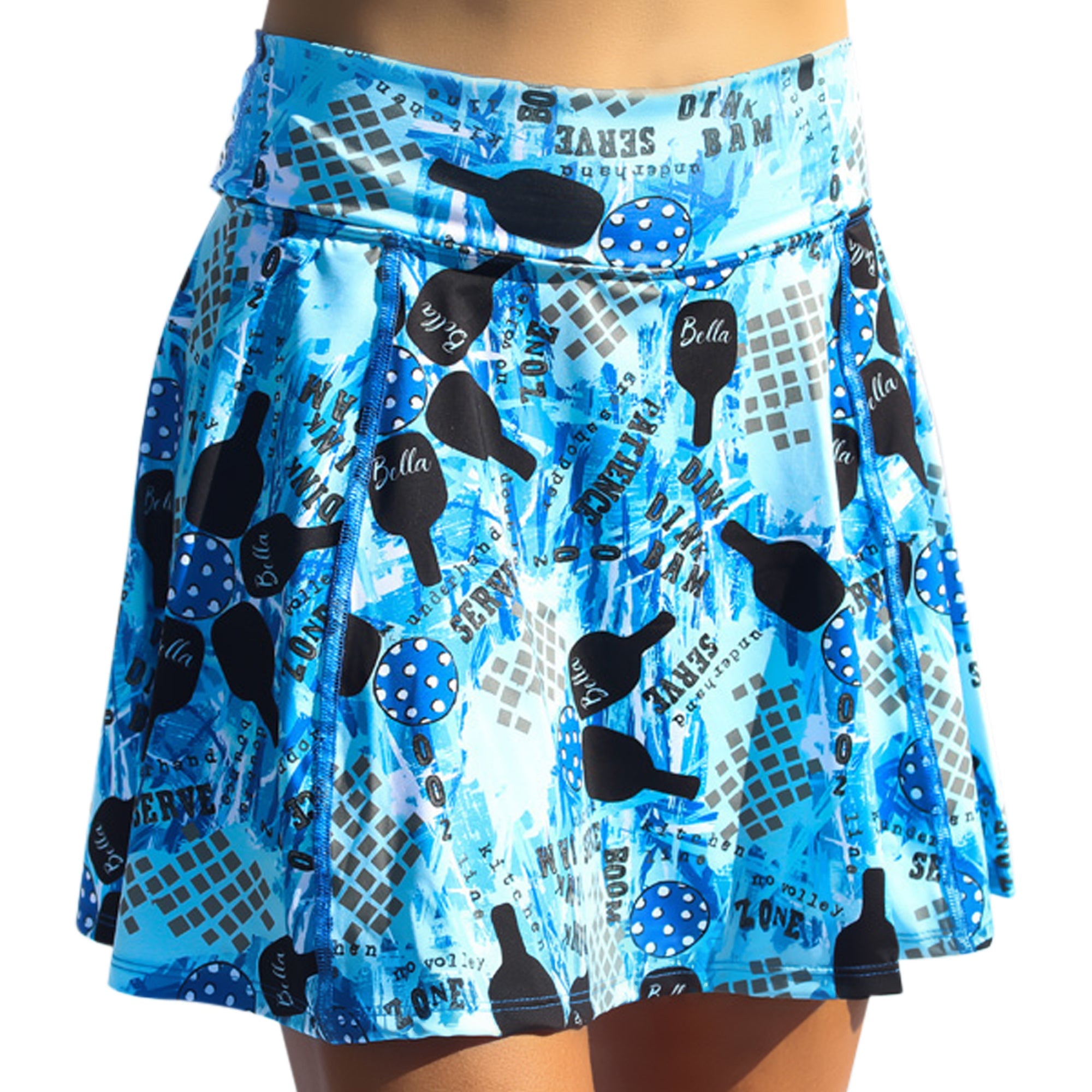 Blue graffiti print A-line skort by Pickleball Bella, featuring paddles, balls, and text.