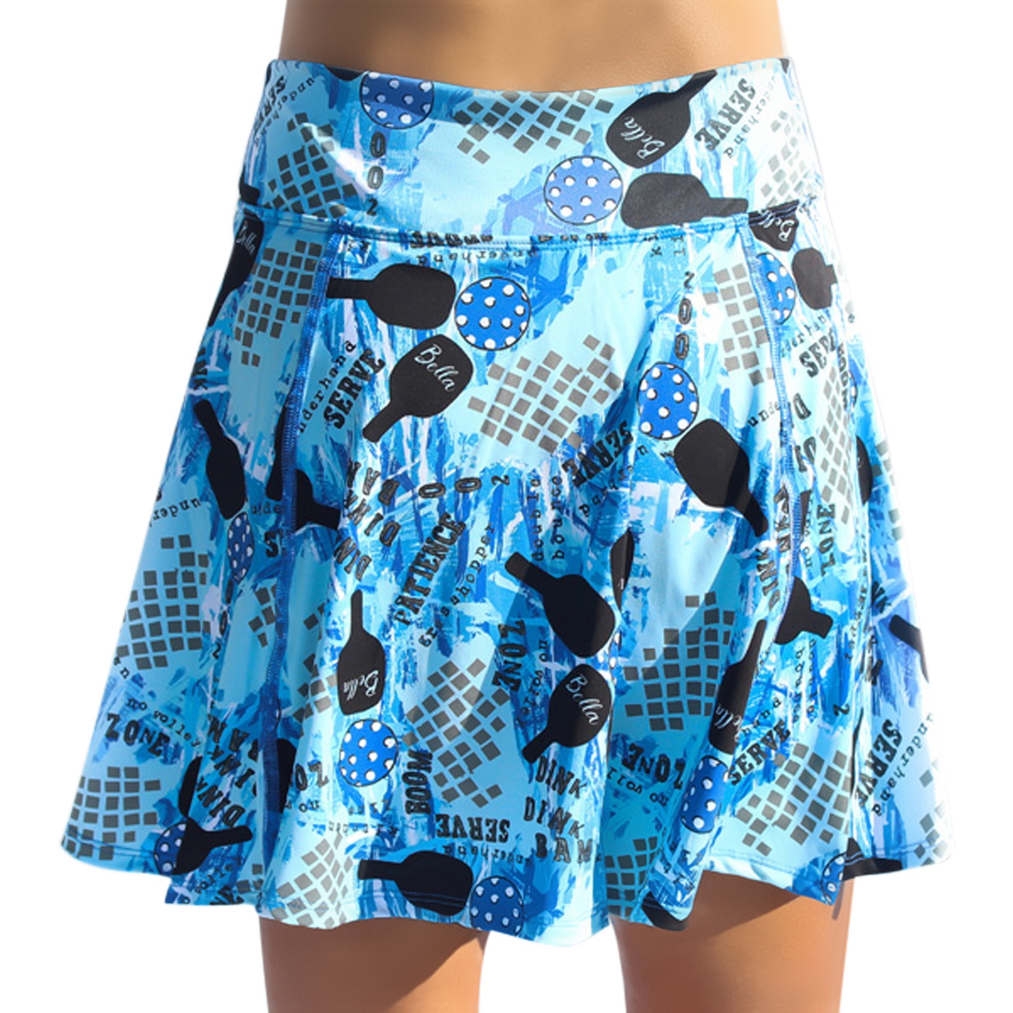 Blue A-Line Skort with graffiti print by Pickleball Bella, featuring pickleball paddles, balls, and court phrases.