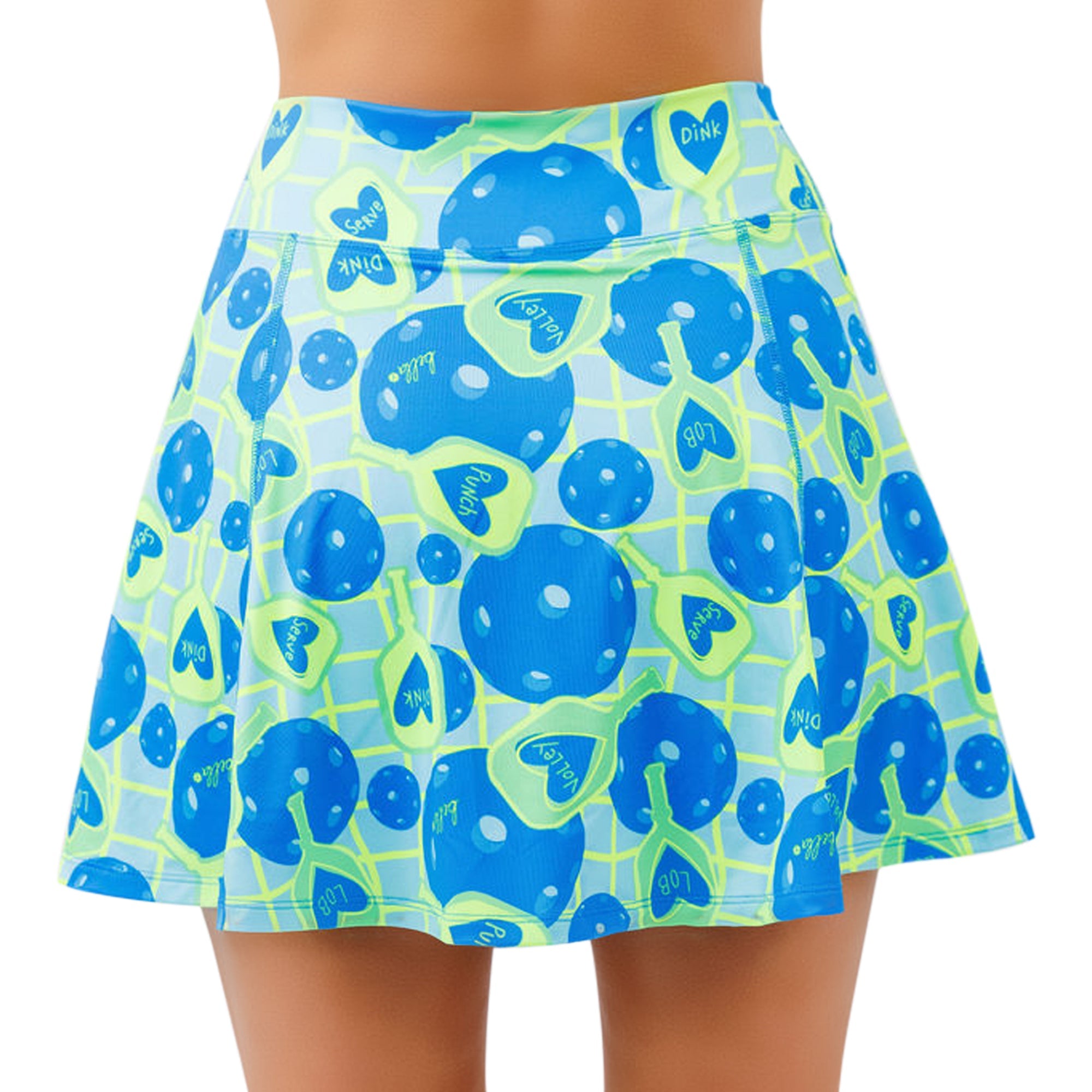 Blue and green pickleball-themed A-line skort by Pickleball Bella, featuring paddles, balls, and game terms on a grid pattern.