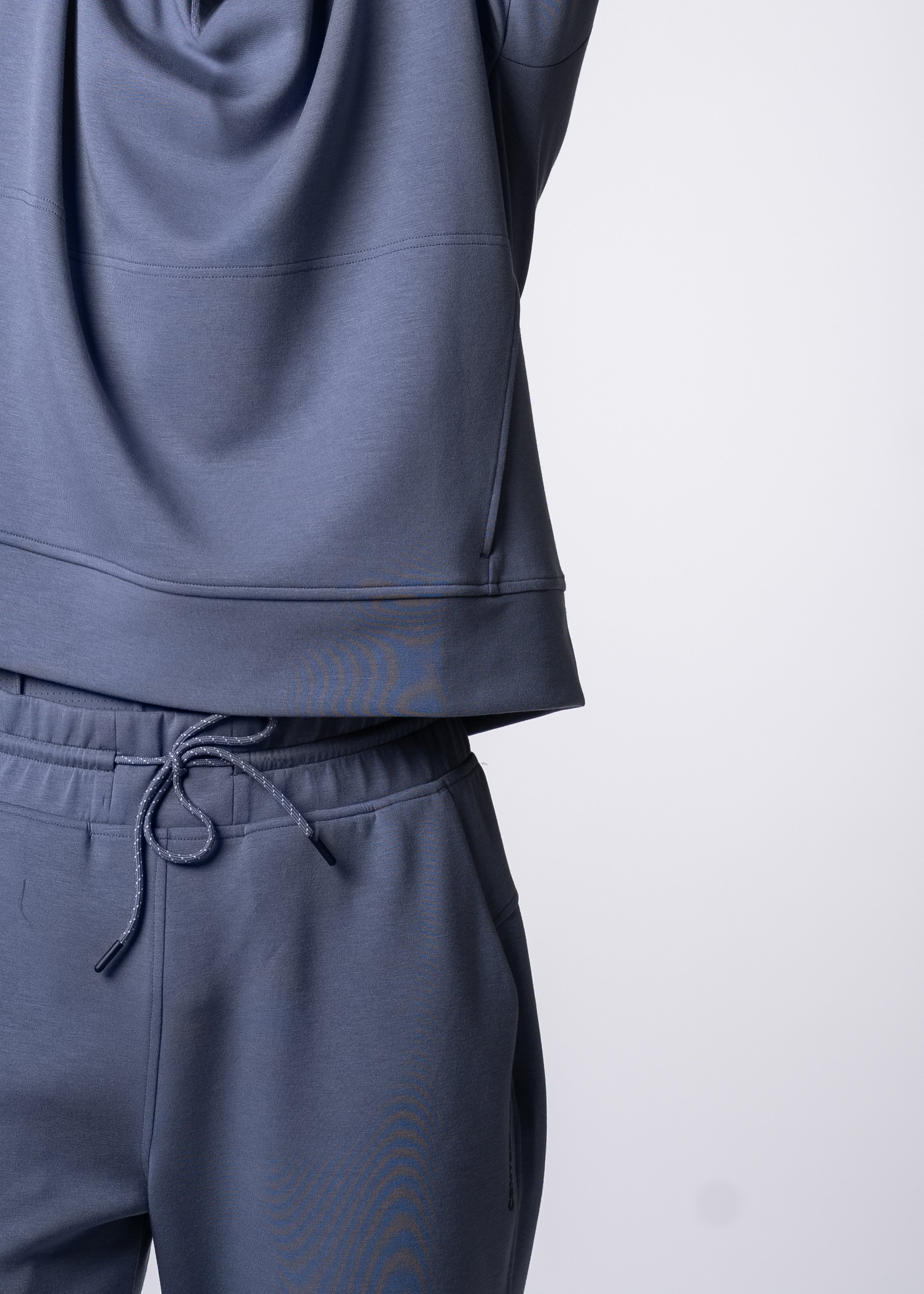Blue matching sweatshirt and sweatpants.