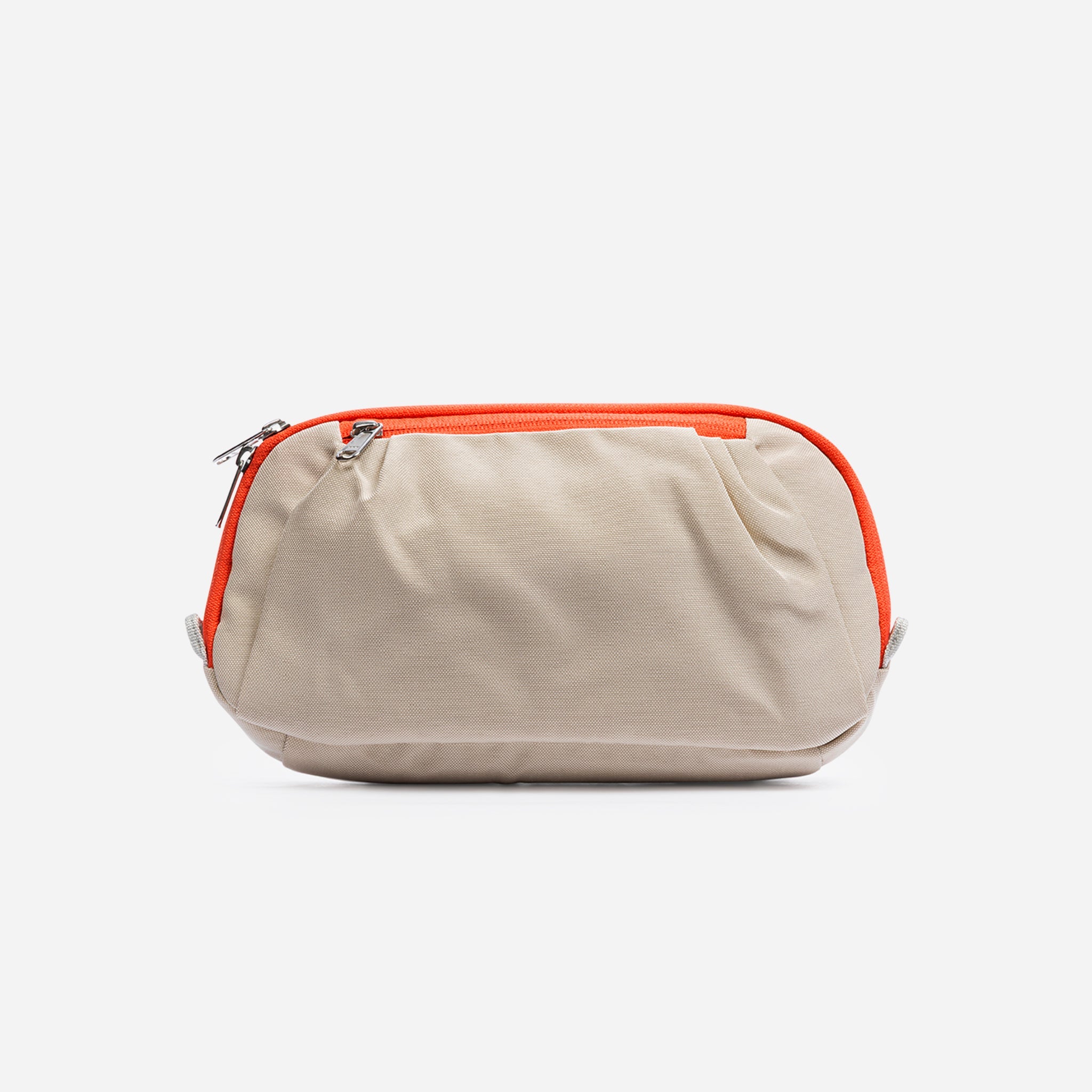 Beige pouch with orange trim and zipper.
