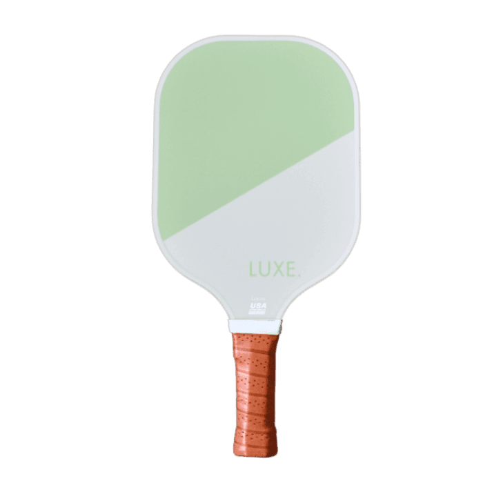 Pickleball paddle with a split green and white face, brown grip, and "LUXE" logo.
