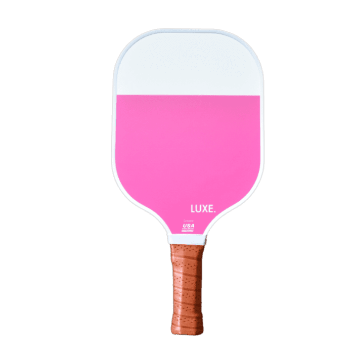 Pink and white pickleball paddle with a brown handle.