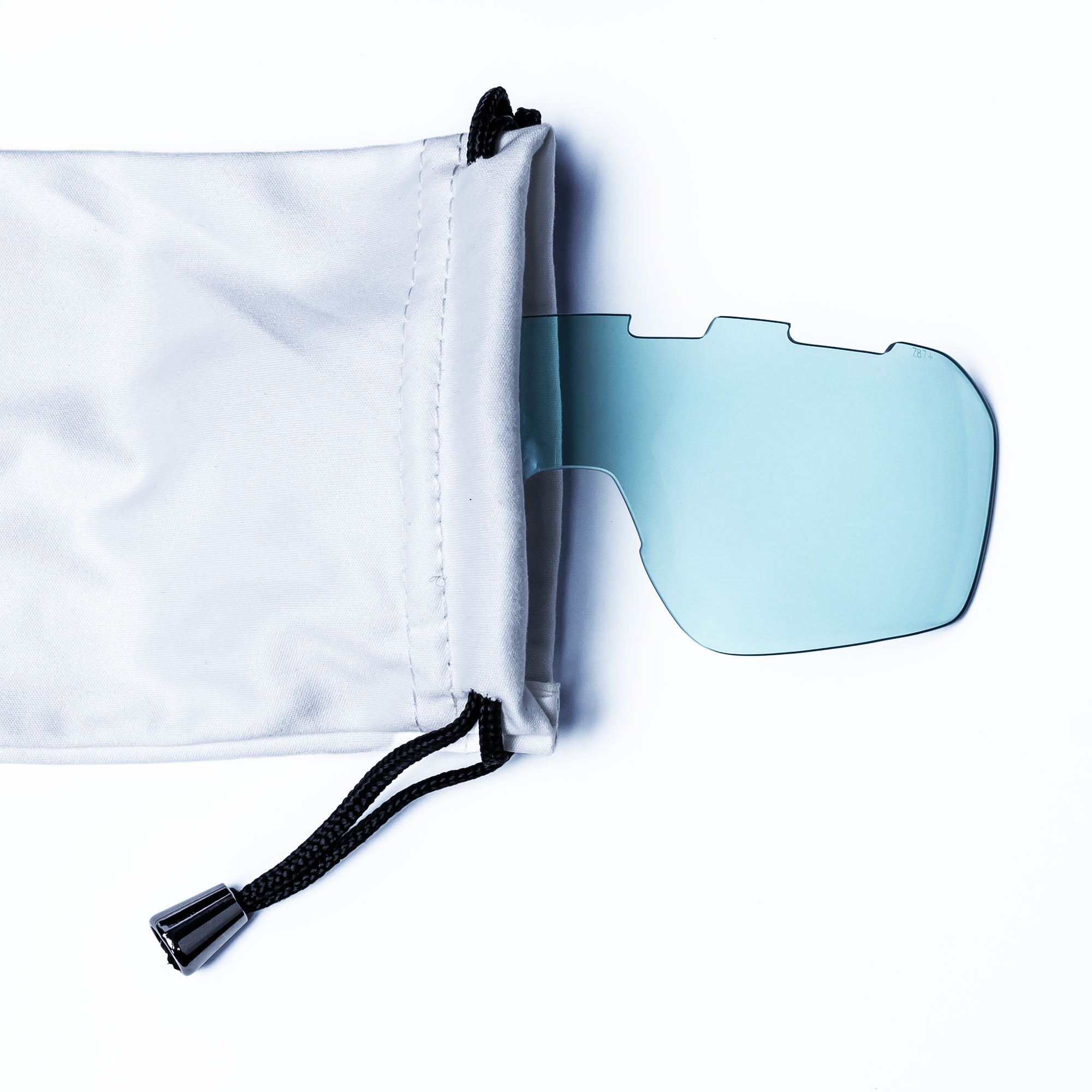 Sunglass lens in a pouch.