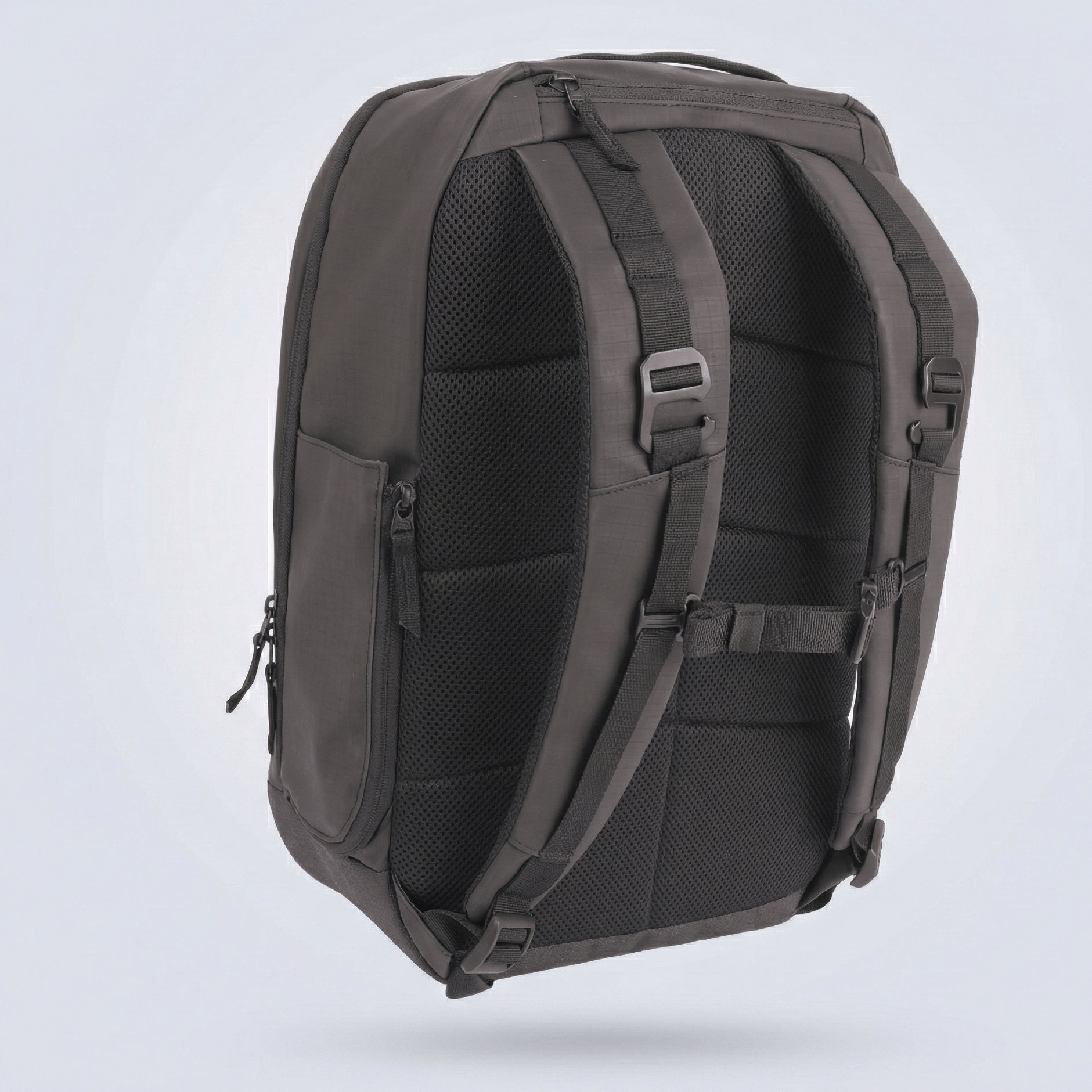 Dark gray pickleball backpack by FORWRD, back view showing mesh padded straps, back panel, and subtle ripstop fabric texture.
