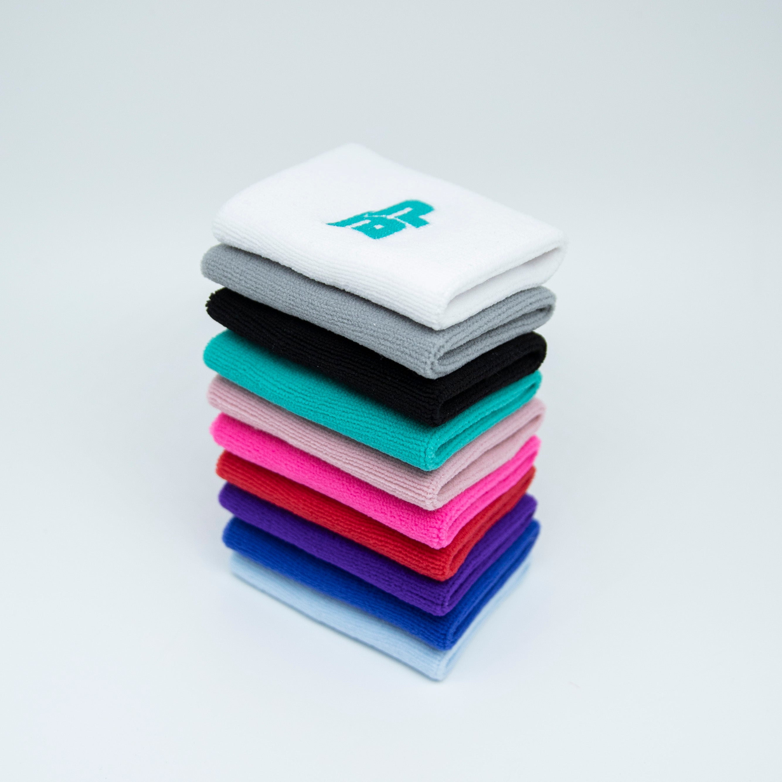 Stack of colorful wristbands.