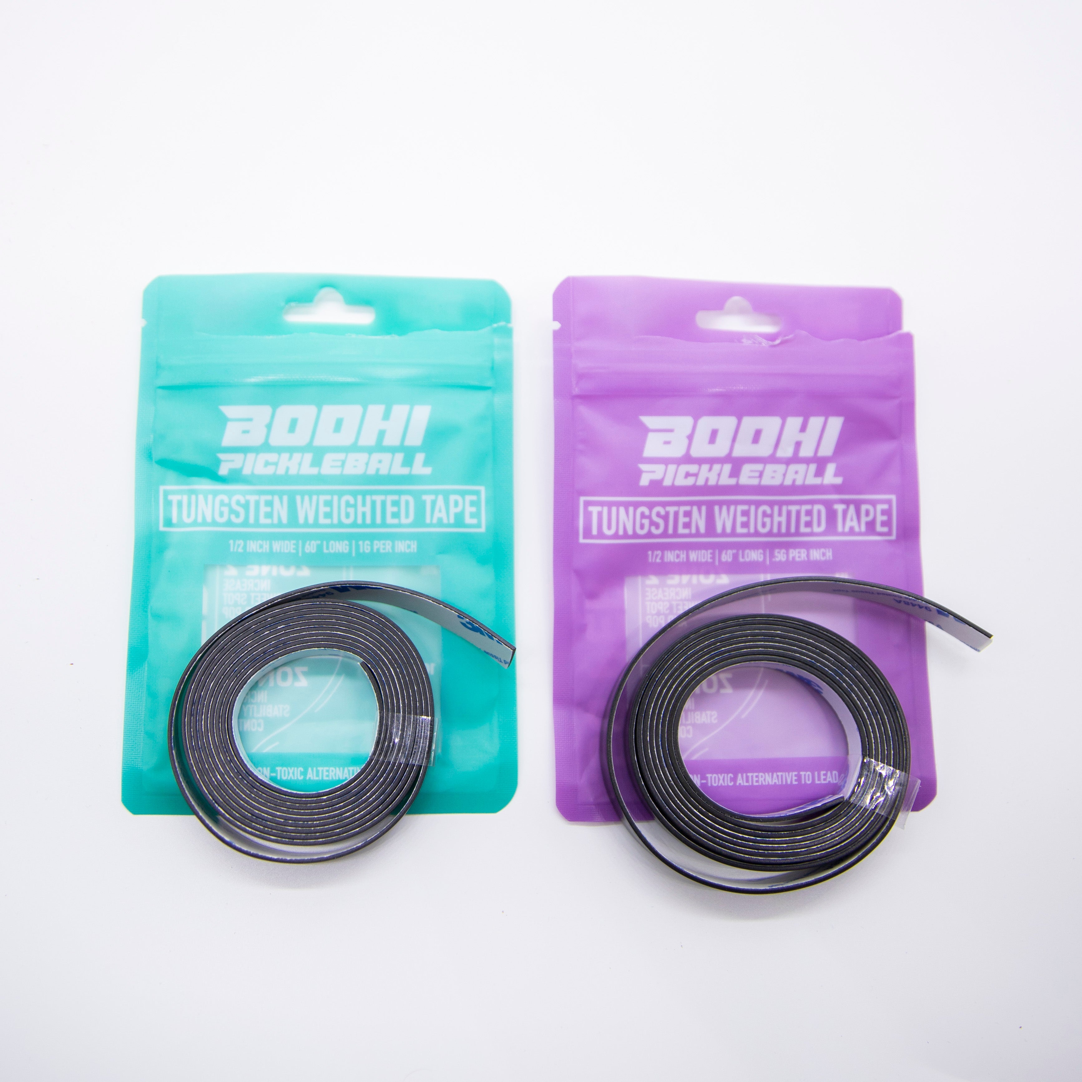 Two packets of Bodhi pickleball tungsten weighted tape, one turquoise and one purple, resting on a white surface.