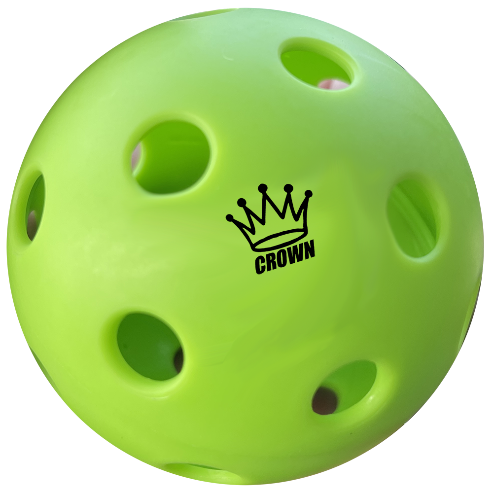 Close-up of a neon green pickleball with a black crown logo.