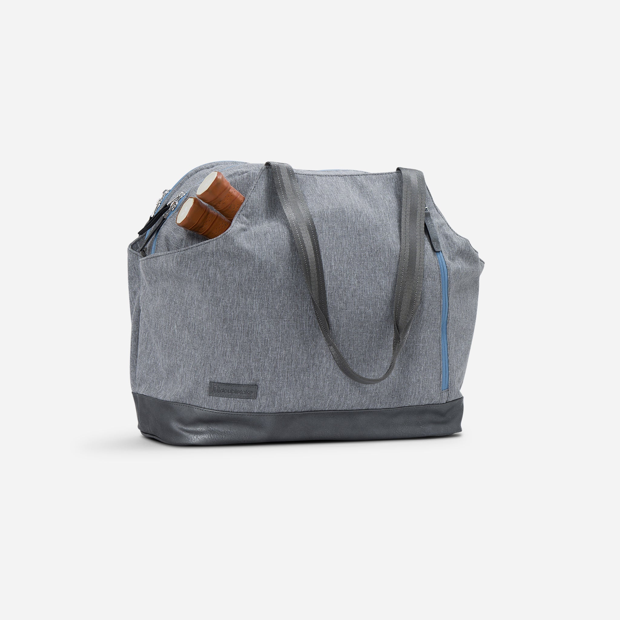 Gray canvas tote bag with leather accents.