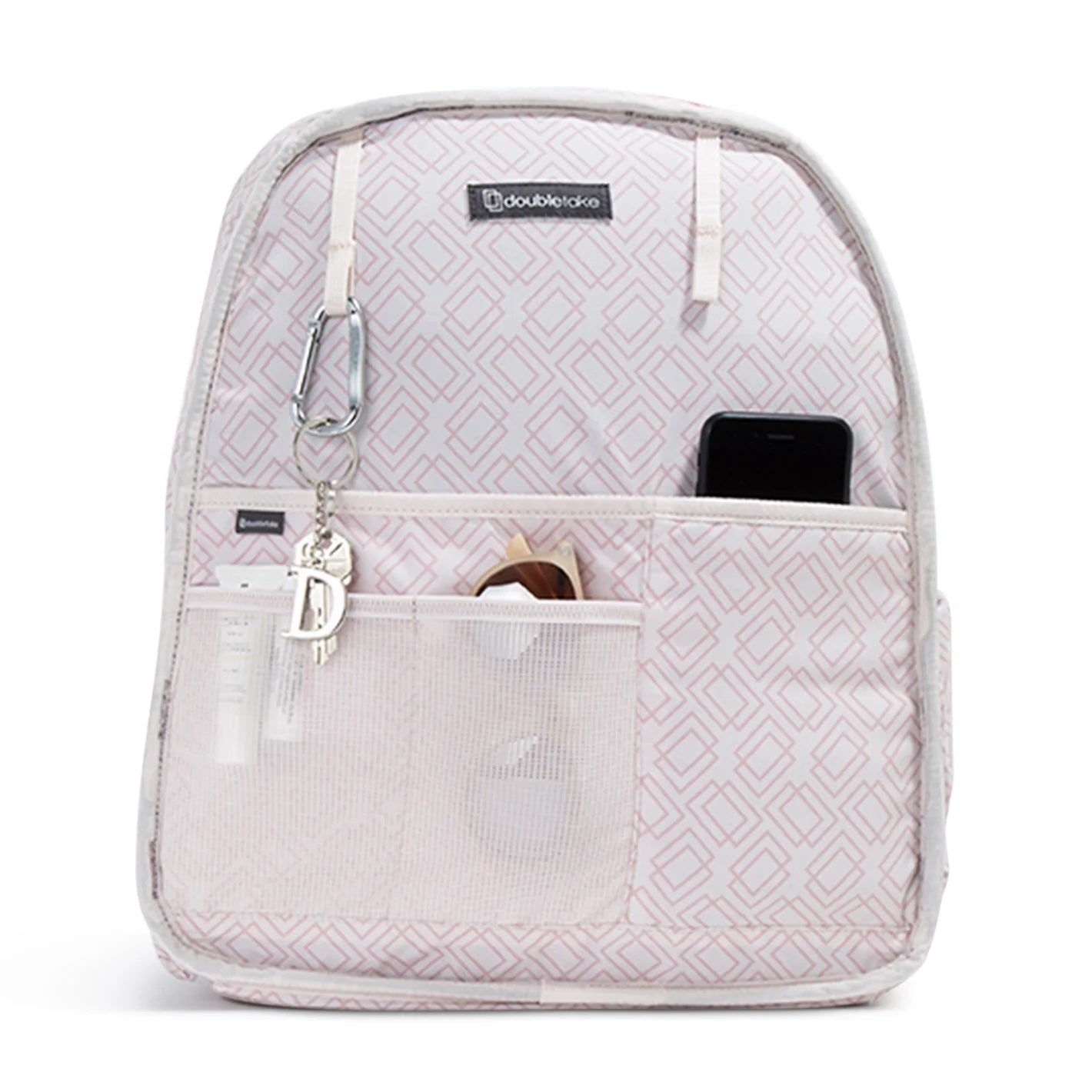 Light-pink pickleball backpack and tote by Doubletake, featuring a geometric pattern and organized interior with pockets holding a phone, keys, and sunglasses.