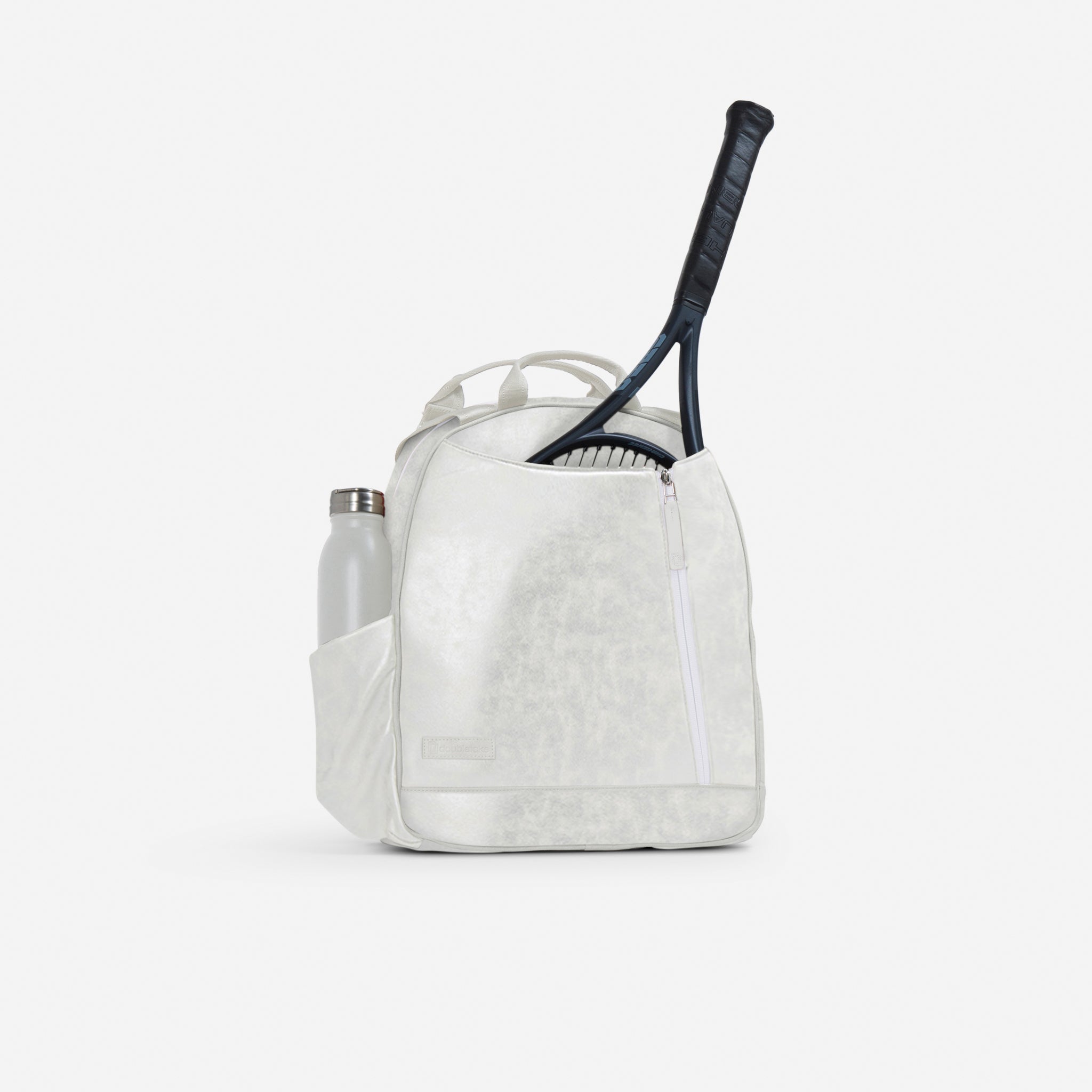 Shimmering white textured tennis backpack by Doubletake with a tennis racket and water bottle, frontal view.