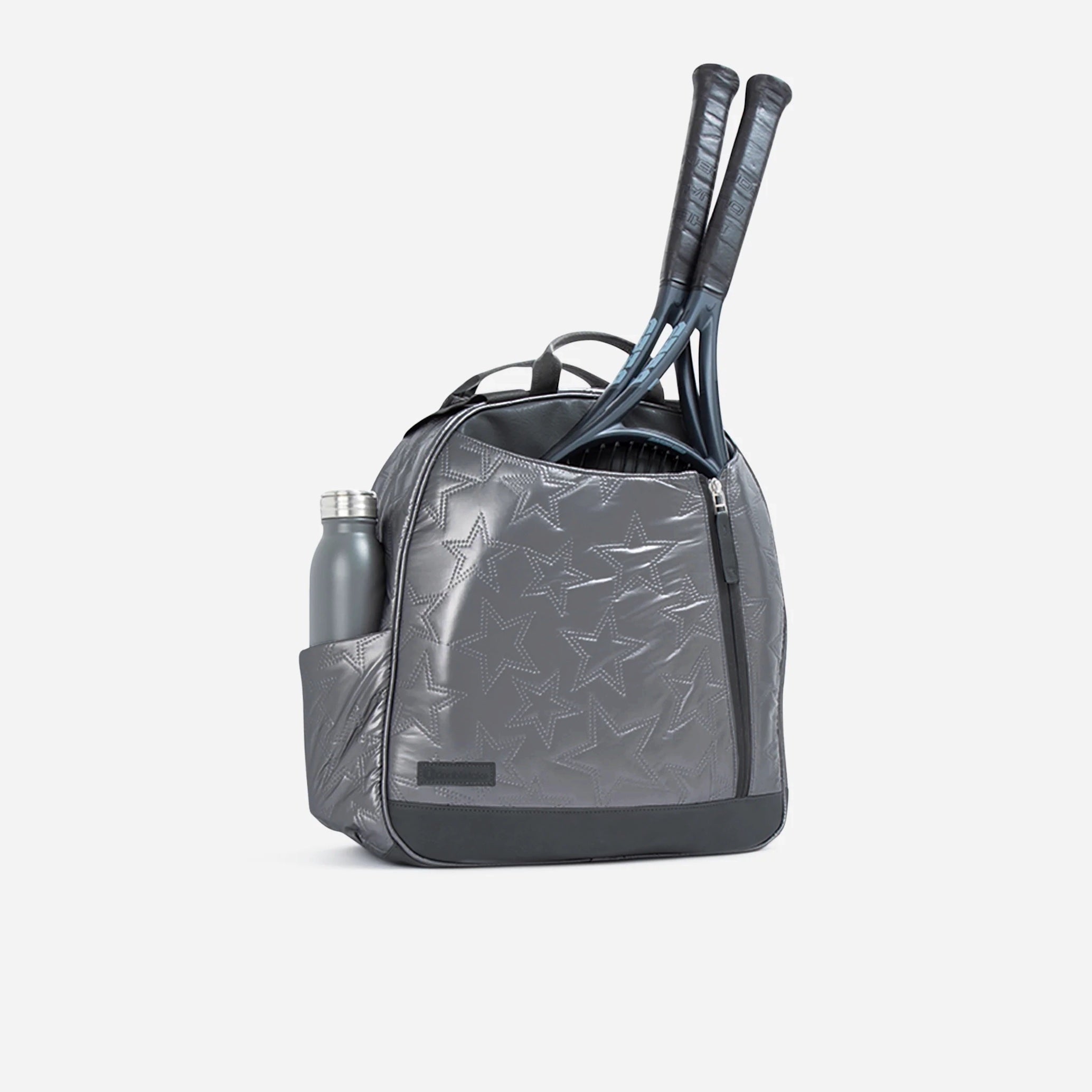 Grey glossy tennis backpack and tote bag by Doubletake with quilted star pattern, a side water bottle pocket, and two tennis rackets.