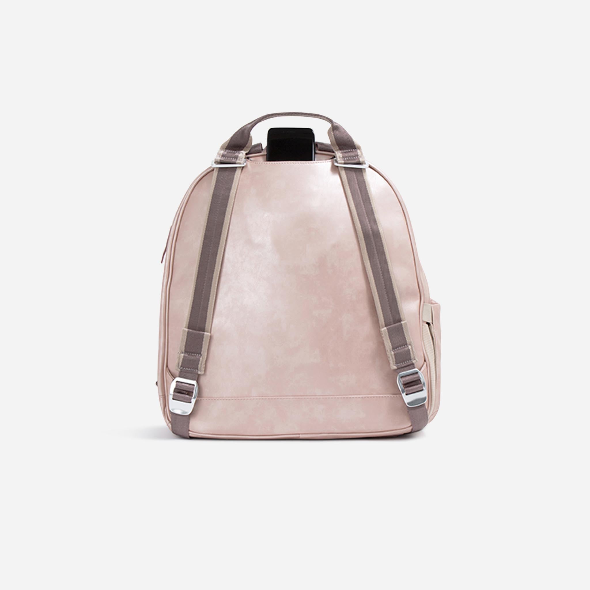 Shimmery pink tennis backpack by Doubletake, seen from the back with brown adjustable straps and a black phone in the top pocket.