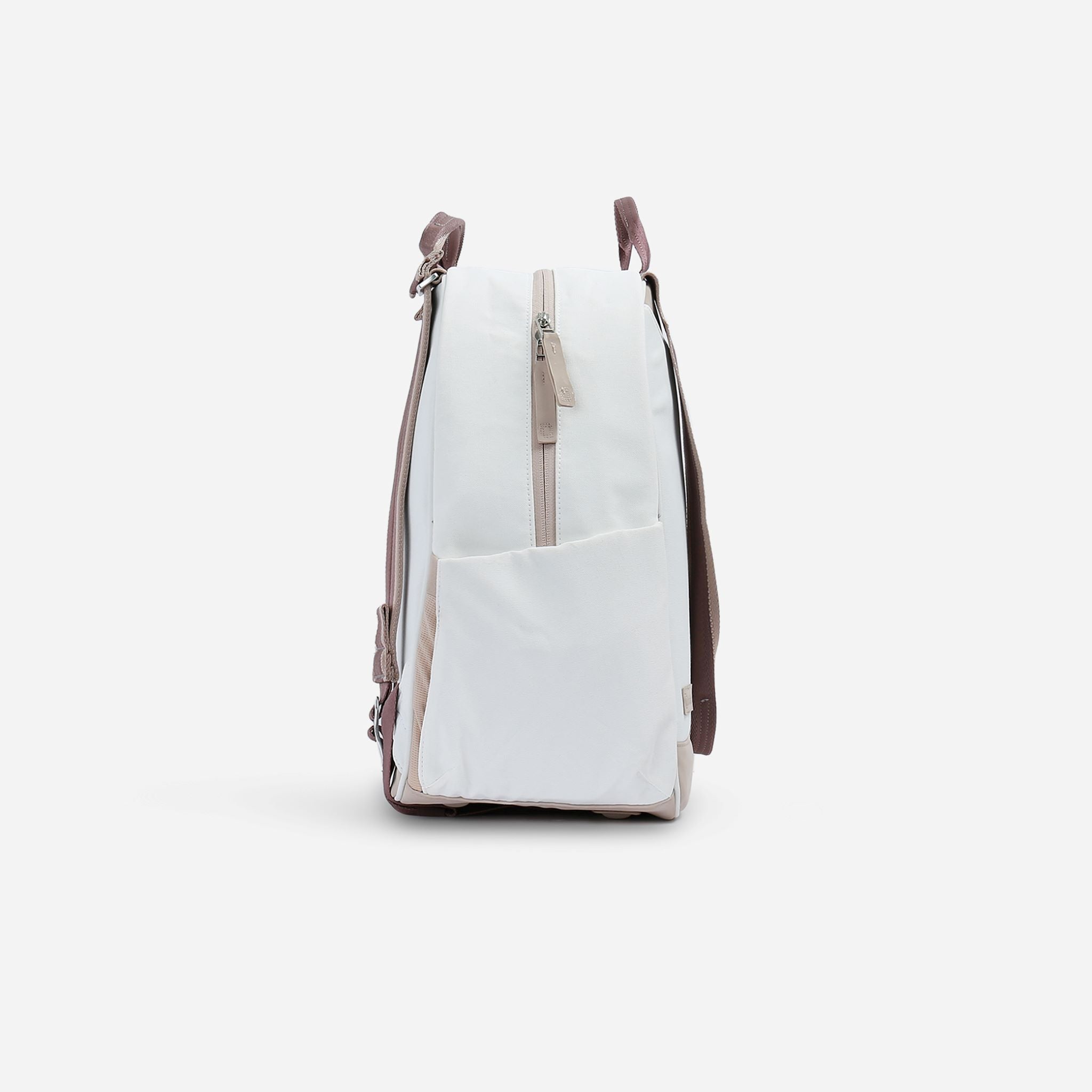White and beige tennis backpack by Doubletake with a vertical front zipper pocket and side pocket, seen from the side.