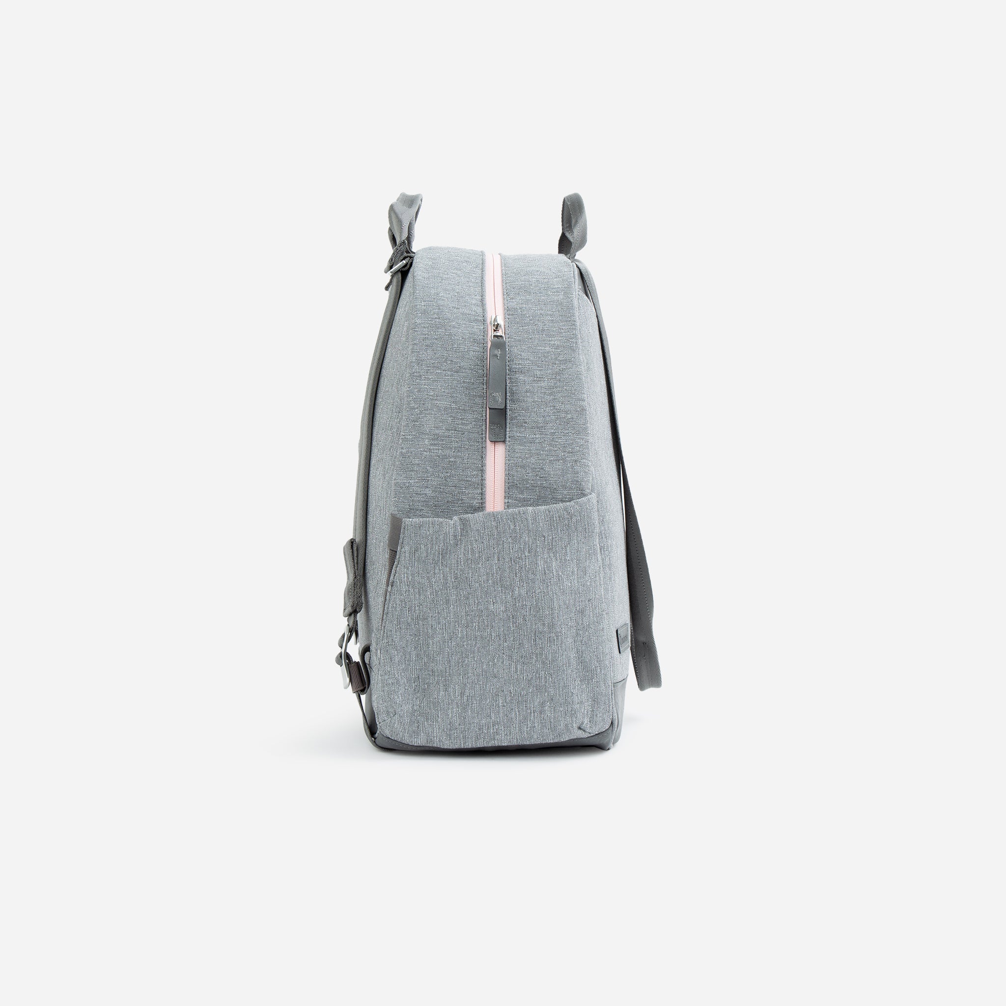 Grey heathered tennis backpack and tote by Doubletake with a prominent pink zipper and front pocket, viewed from the side.