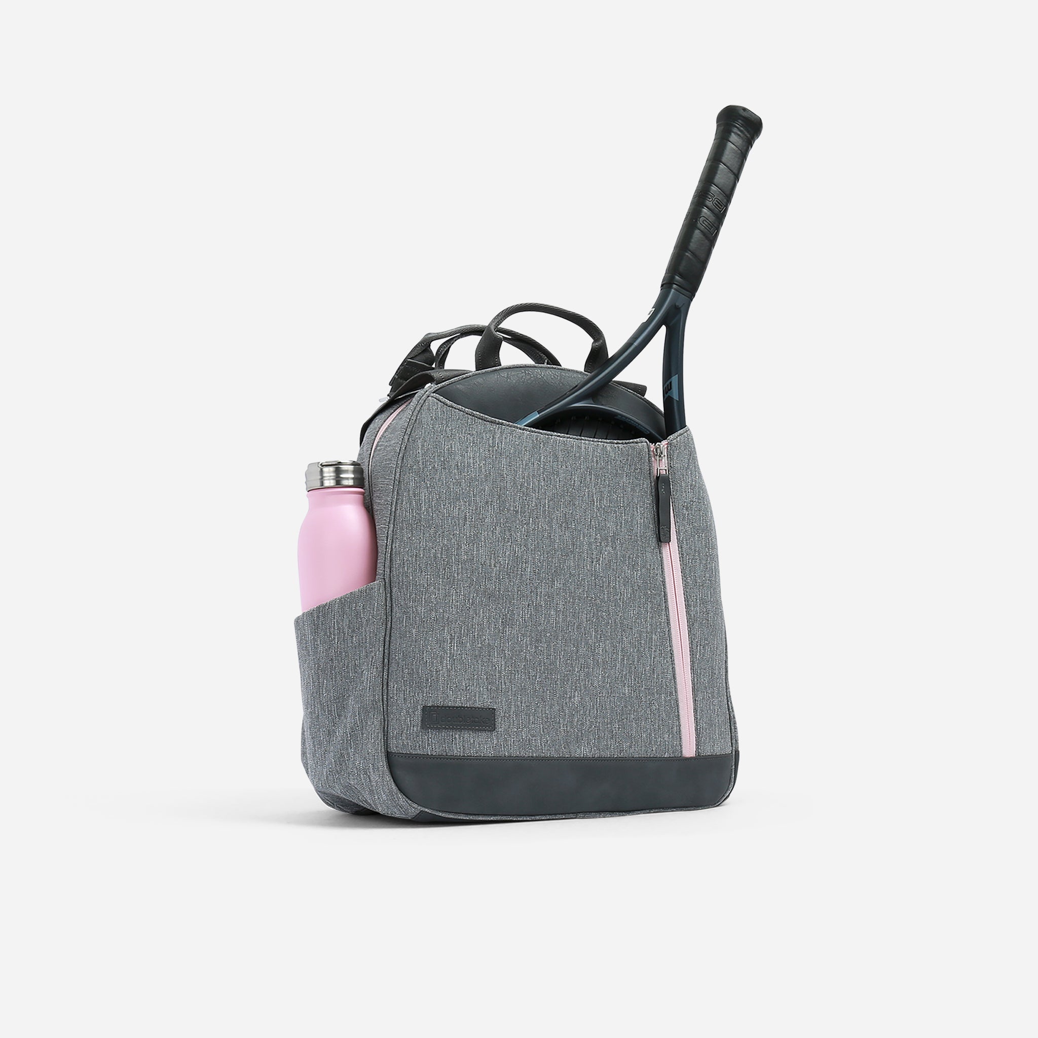 Heather gray tennis backpack by Doubletake, side view, with a pink water bottle and tennis racket, and pink zipper.