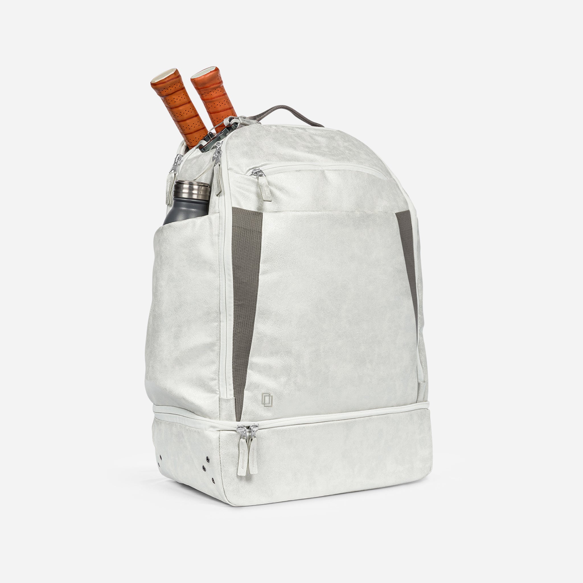 White tennis backpack with racquets and water bottle.