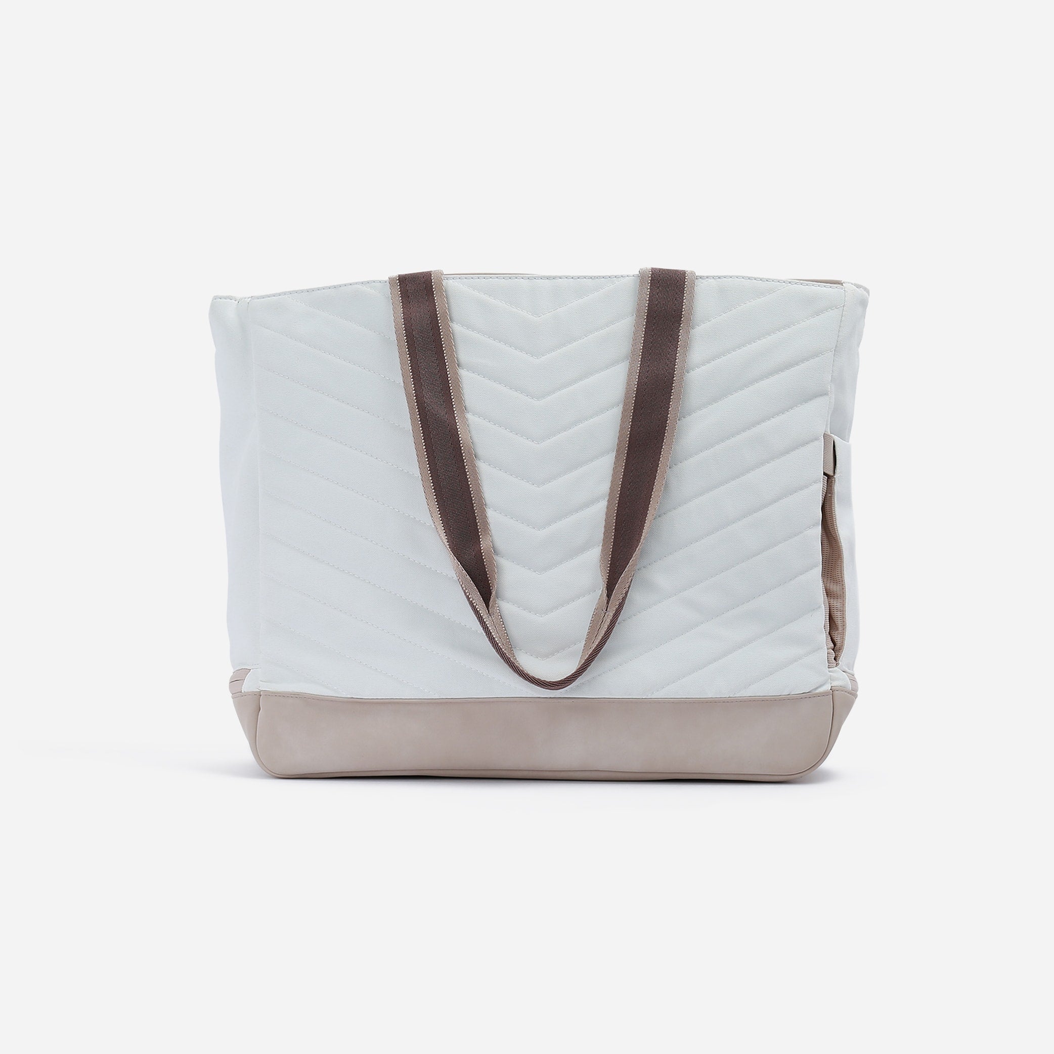 White quilted Tennis Tote by Doubletake with brown chevron straps and a taupe bottom panel.