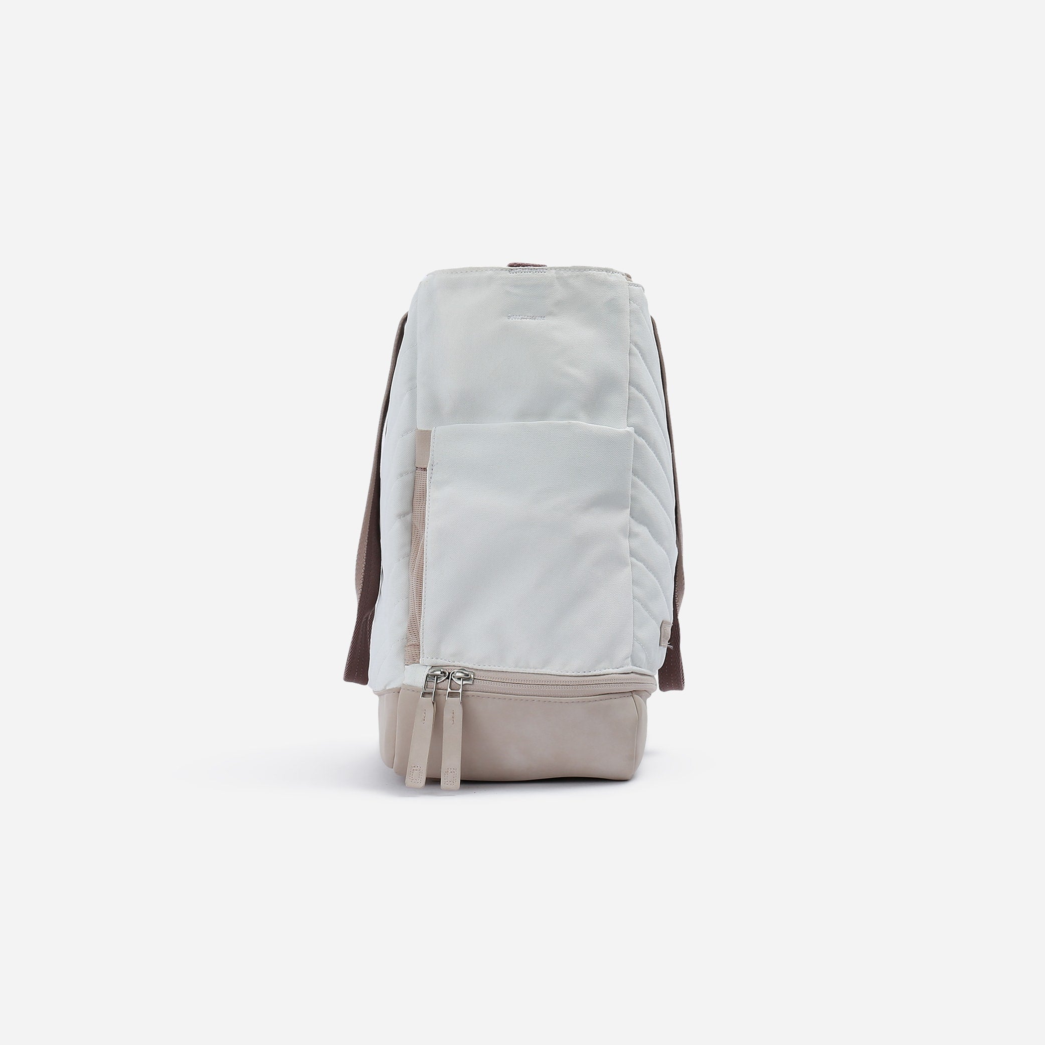 Light grey and beige Tennis Tote by Doubletake with a quilted upper and front zippered pocket, shown from the front.