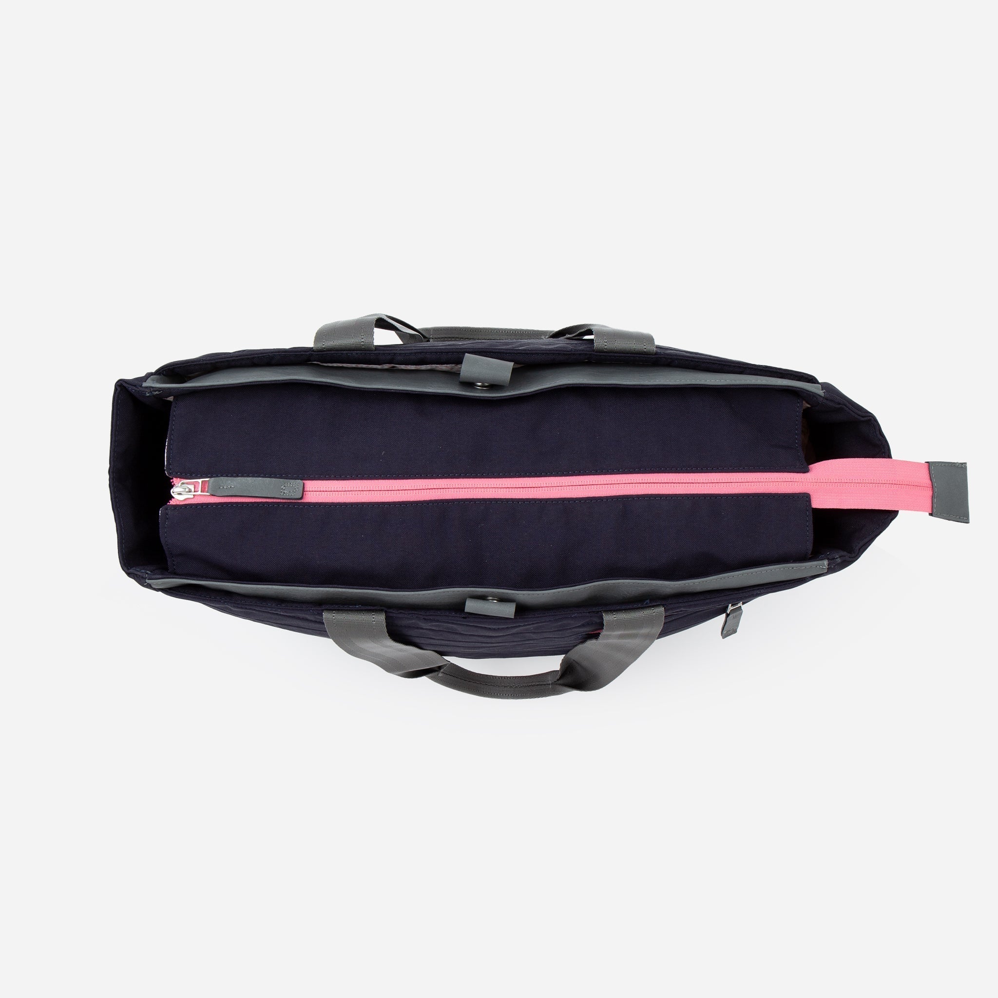 Navy blue Pickleball Tote by Doubletake with grey handles and a prominent pink zipper, viewed from above.