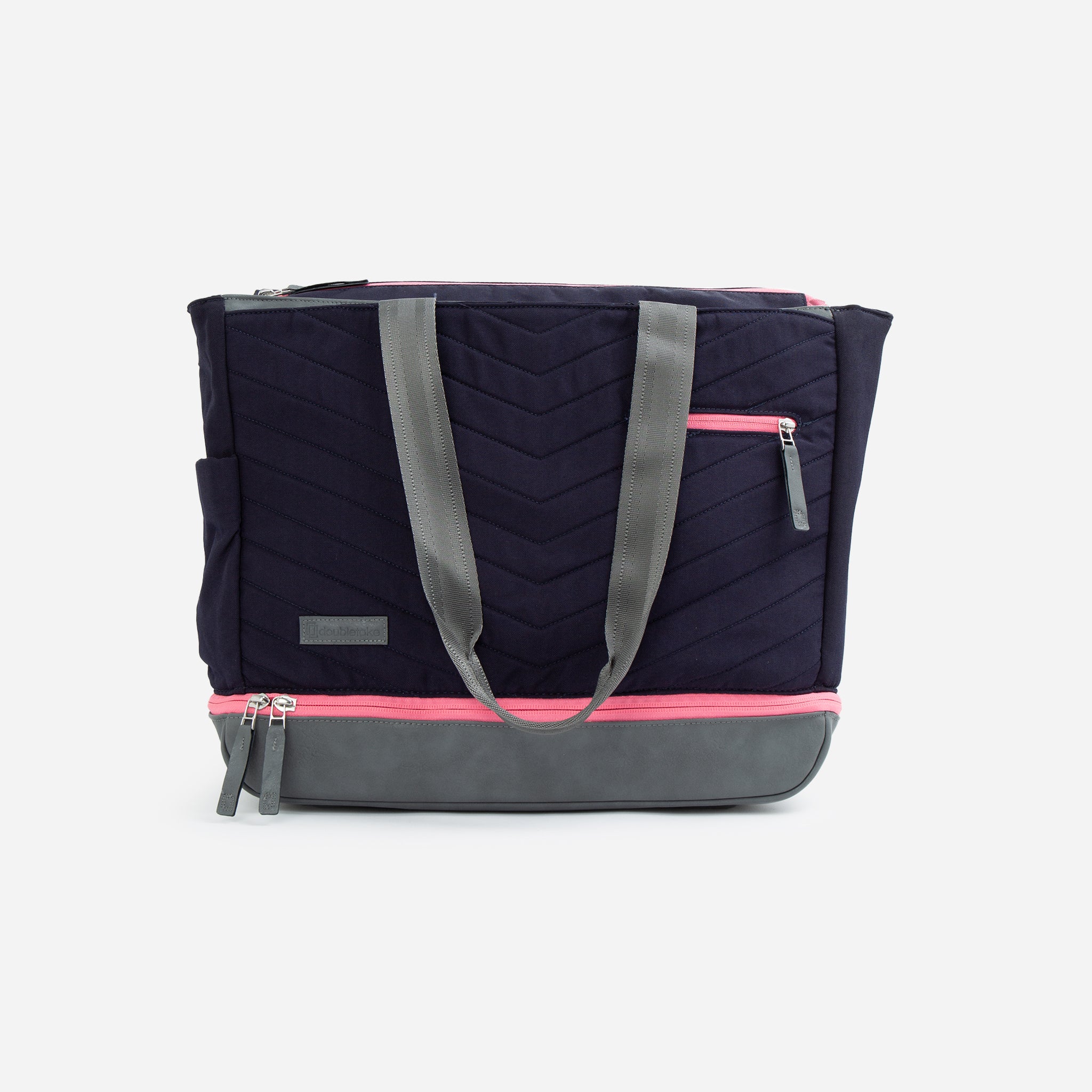 Navy quilted tote bag with pink and gray accents.