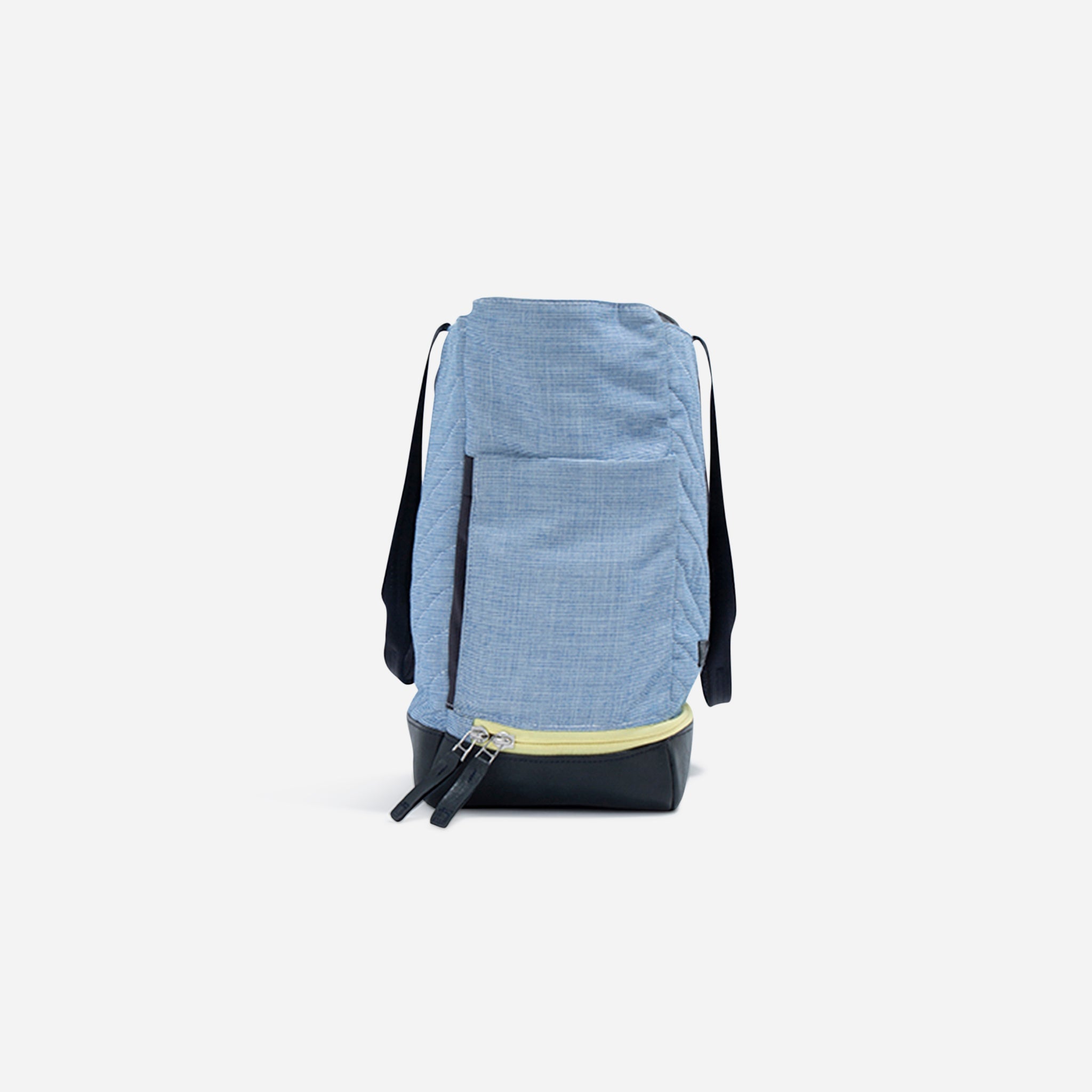 Light blue textured pickleball tote by Doubletake with a black base and yellow bottom zipper.