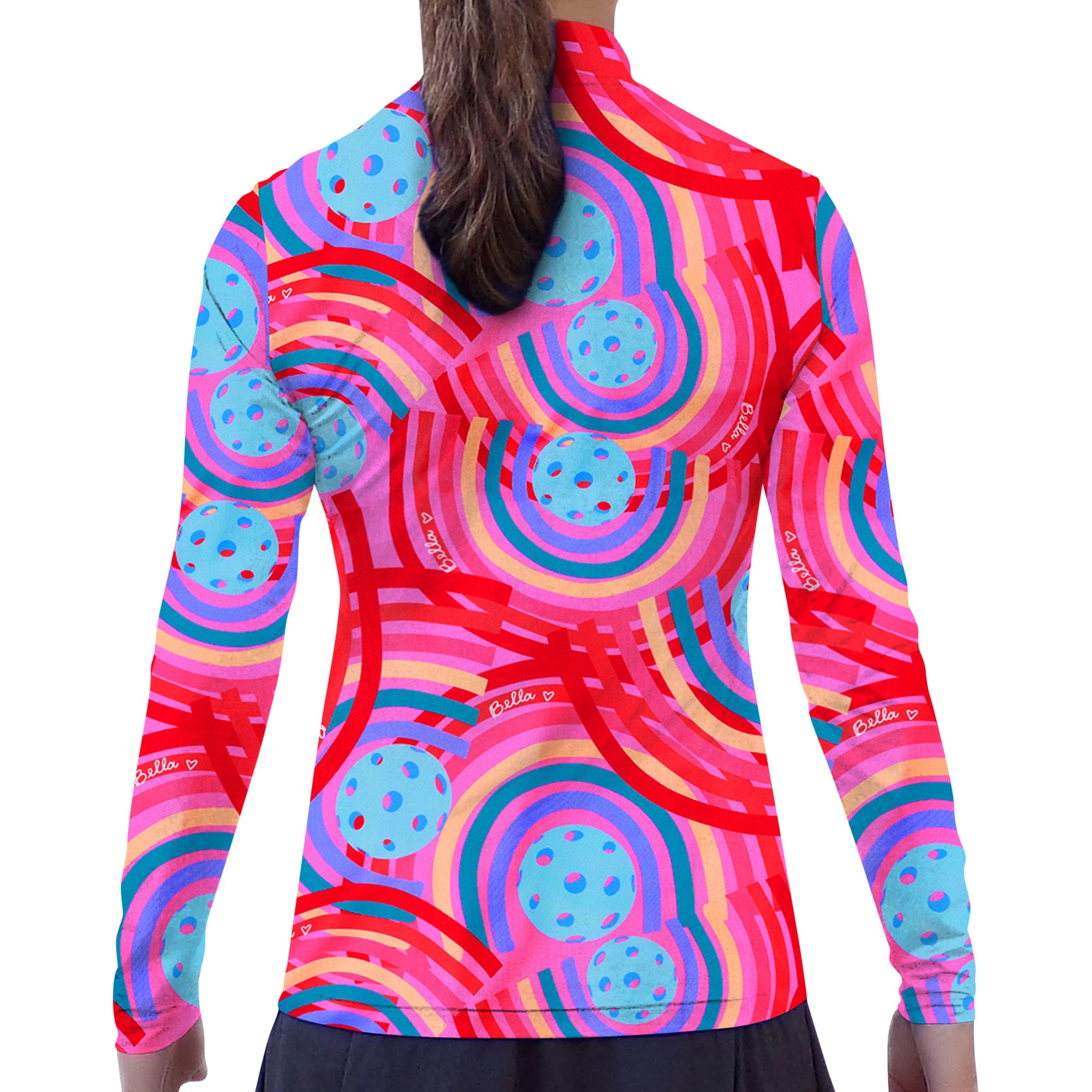Long sleeve 1/4 zip pullover by Pickleball Bella, featuring a vibrant pattern of rainbow arches and blue pickleballs with 'Bella ♡' text, shown from the back.